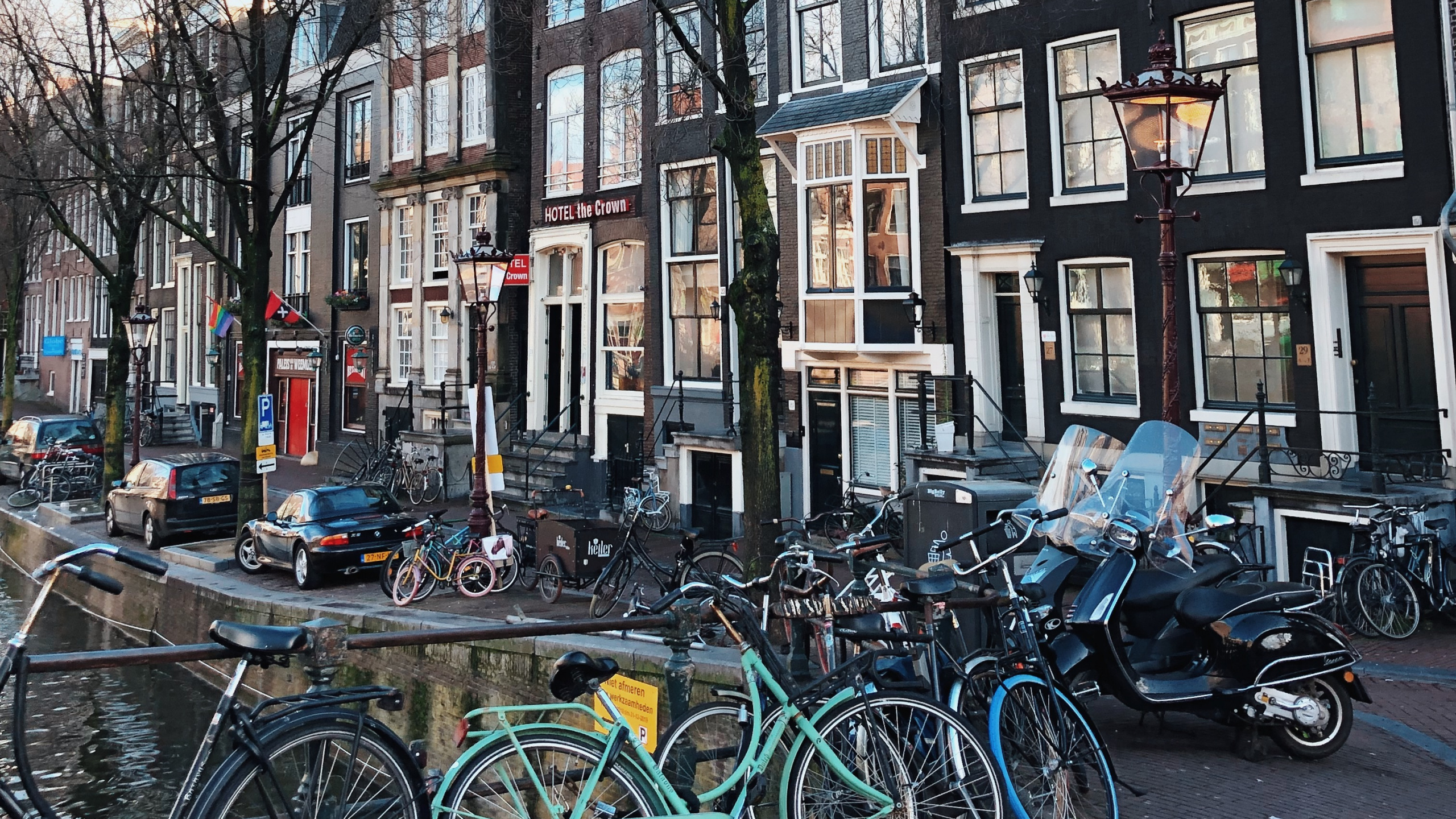 Bicycles Parked in Front of Building During Daytime. Wallpaper in 2560x1440 Resolution
