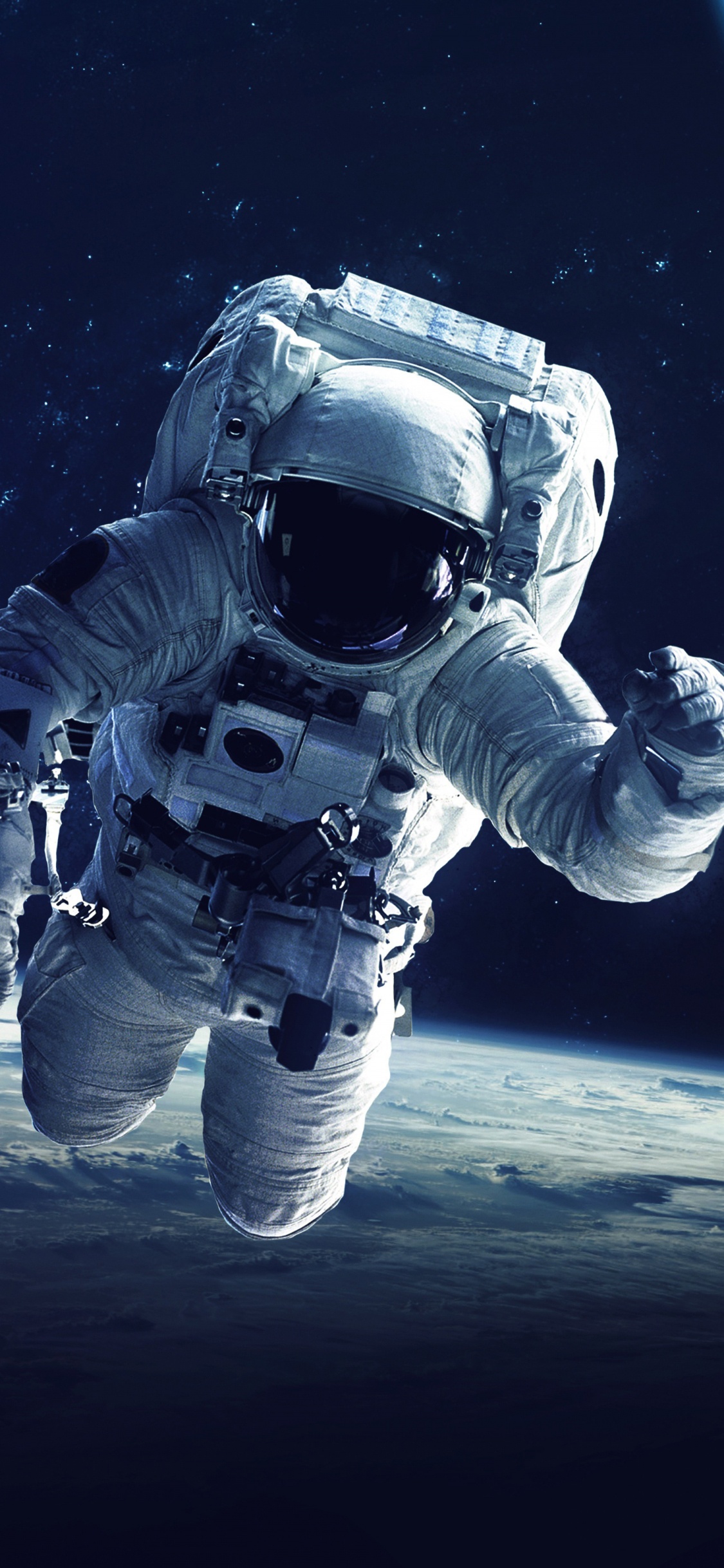 Person in White and Black Suit With Blue and White Helmet. Wallpaper in 1125x2436 Resolution