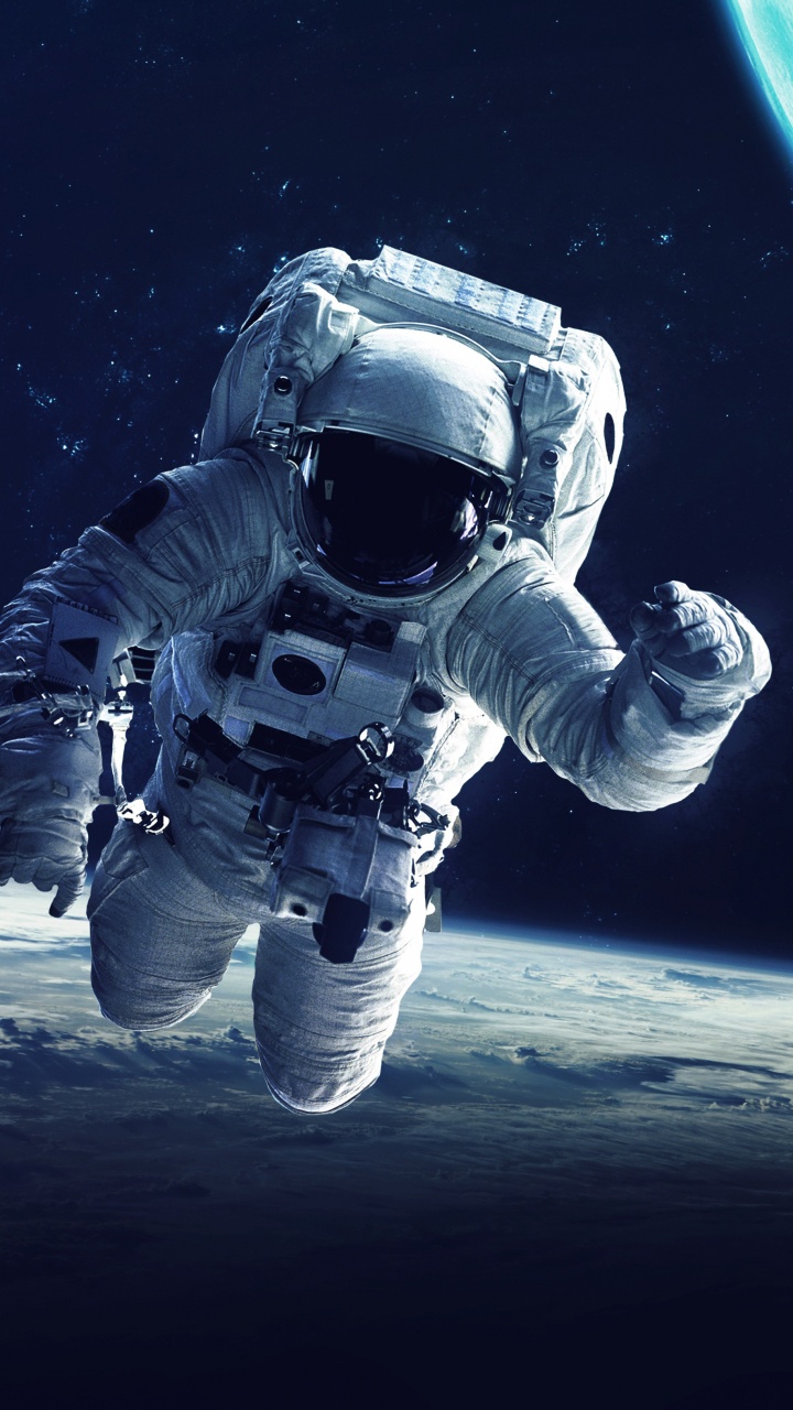 Person in White and Black Suit With Blue and White Helmet. Wallpaper in 720x1280 Resolution