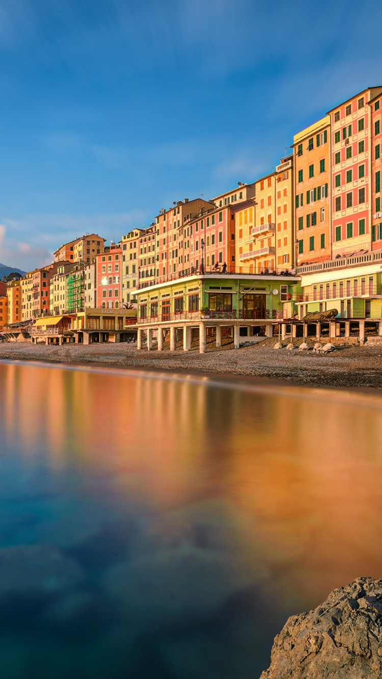 Body of Water Between Buildings During Daytime. Wallpaper in 750x1334 Resolution