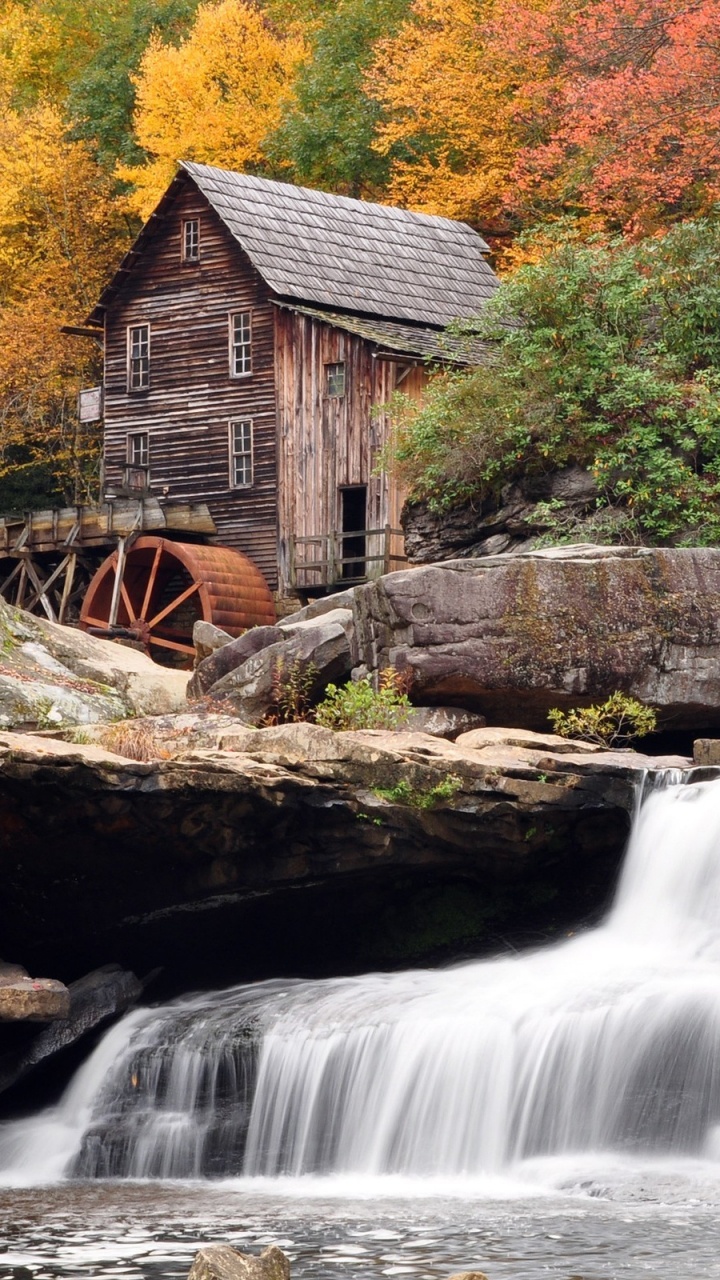 Brown Wooden House Near Waterfalls. Wallpaper in 720x1280 Resolution