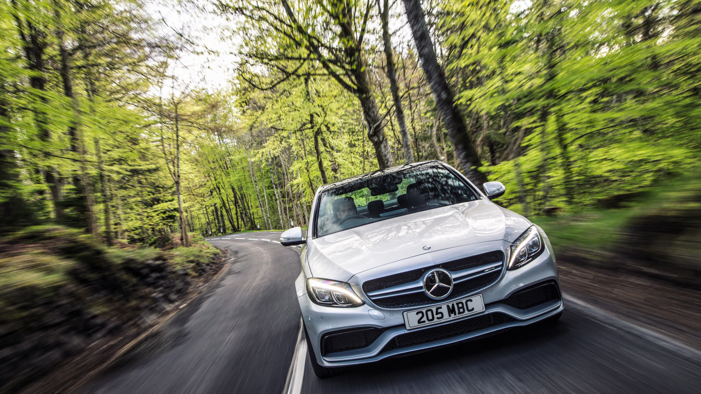 Silver Mercedes Benz Car on Road in Between Trees During Daytime. Wallpaper in 1366x768 Resolution
