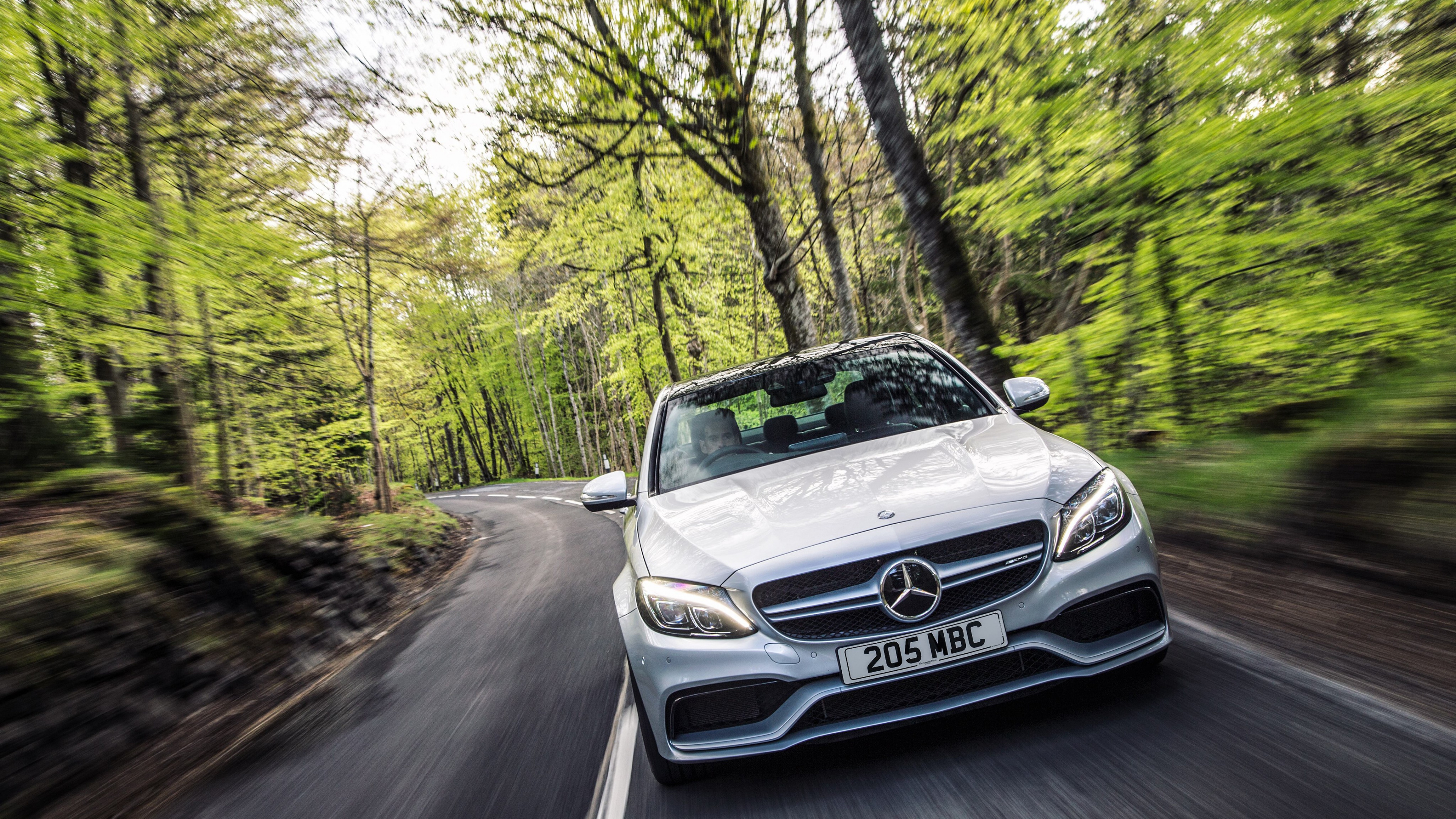 Silver Mercedes Benz Car on Road in Between Trees During Daytime. Wallpaper in 3840x2160 Resolution