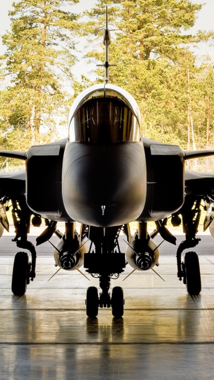 Black and White Drone on Brown Wooden Floor During Daytime. Wallpaper in 720x1280 Resolution