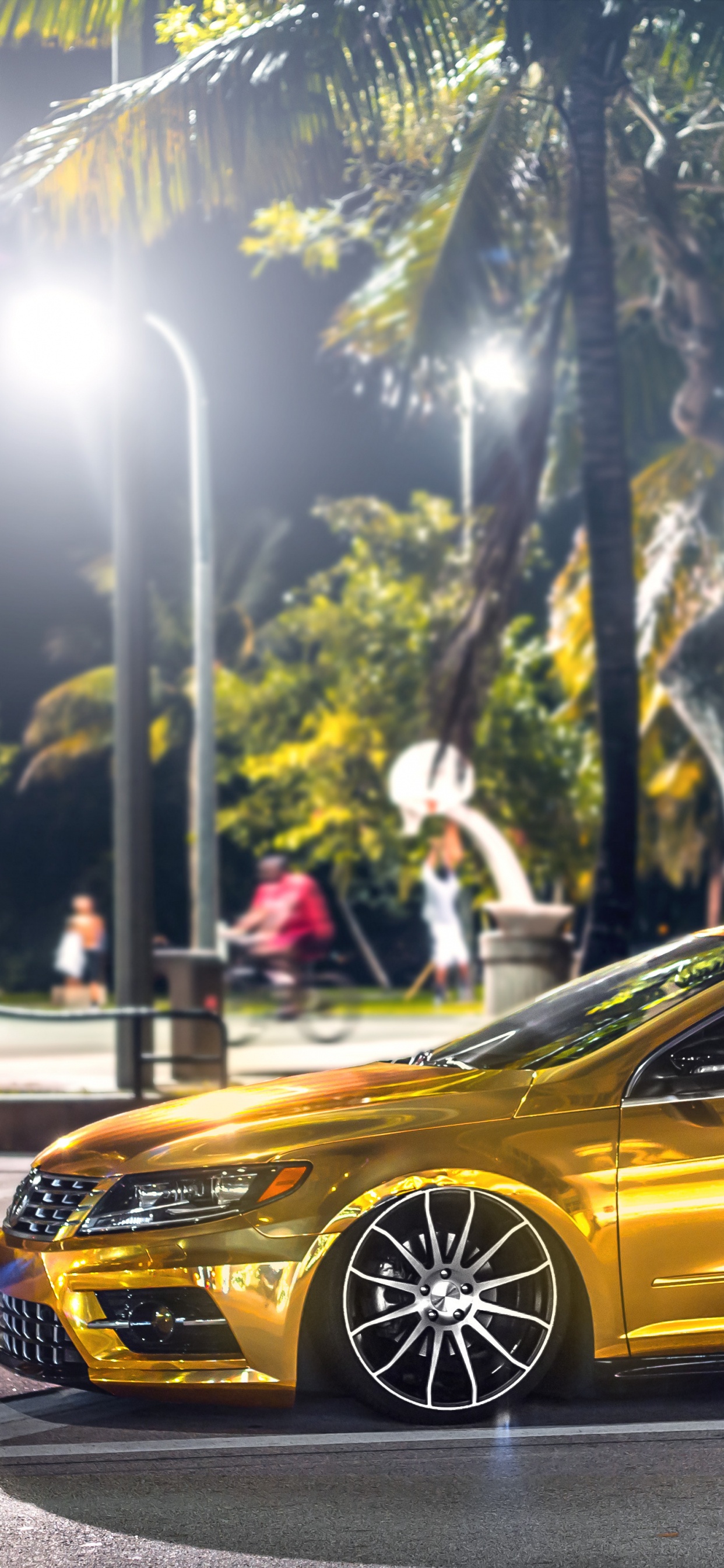 Porsche 911 Jaune Garée Sur Route Pendant la Journée. Wallpaper in 1242x2688 Resolution