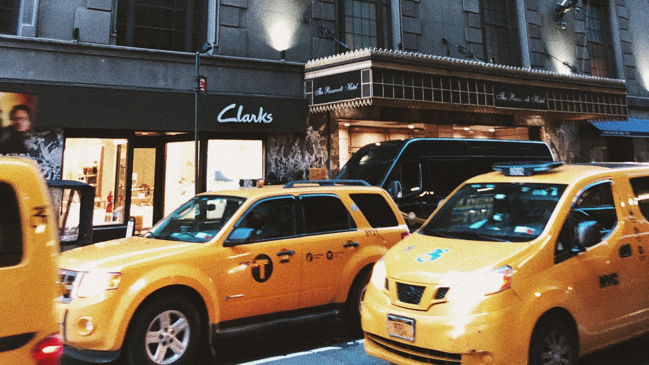 Yellow Taxi Cab on Road Near Building During Daytime. Wallpaper in 1280x720 Resolution