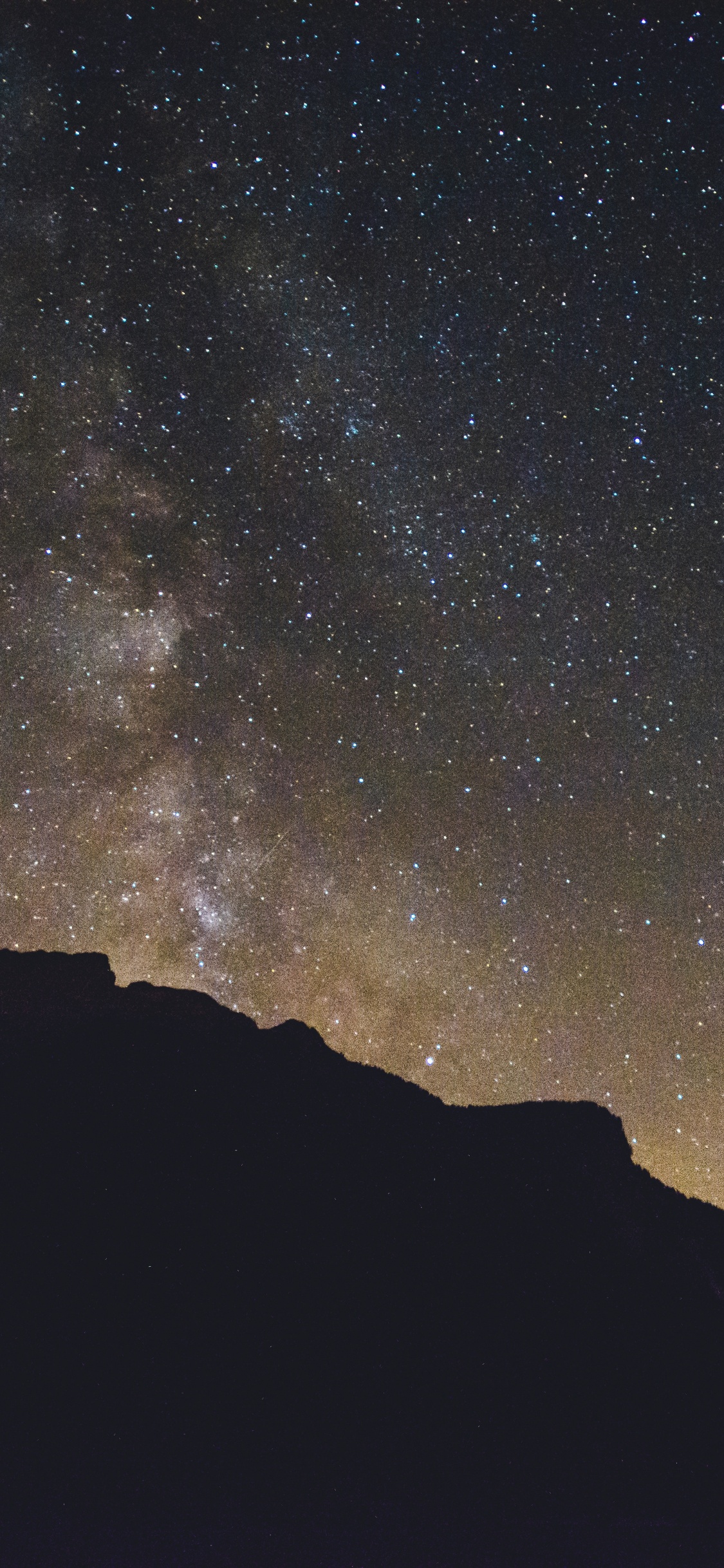 Silueta de Montaña Bajo la Noche Estrellada. Wallpaper in 1125x2436 Resolution