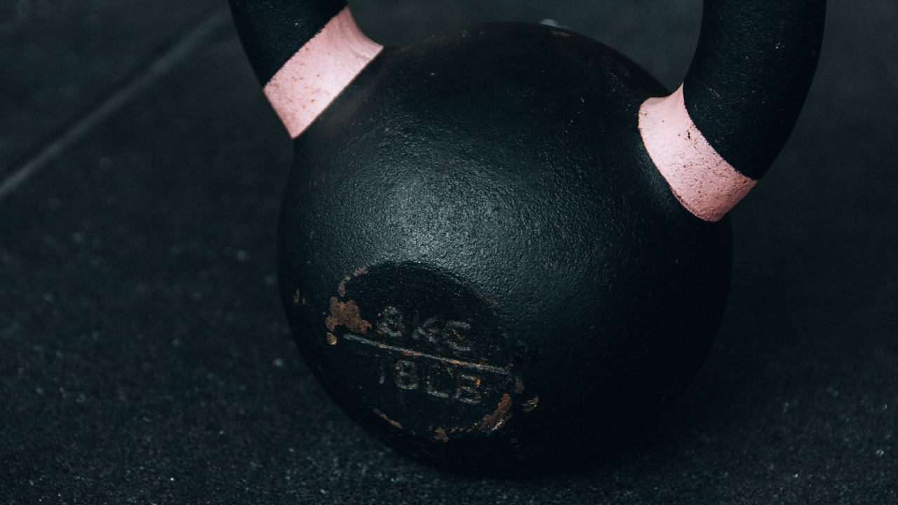Black Kettle Bell on Black Table. Wallpaper in 1280x720 Resolution