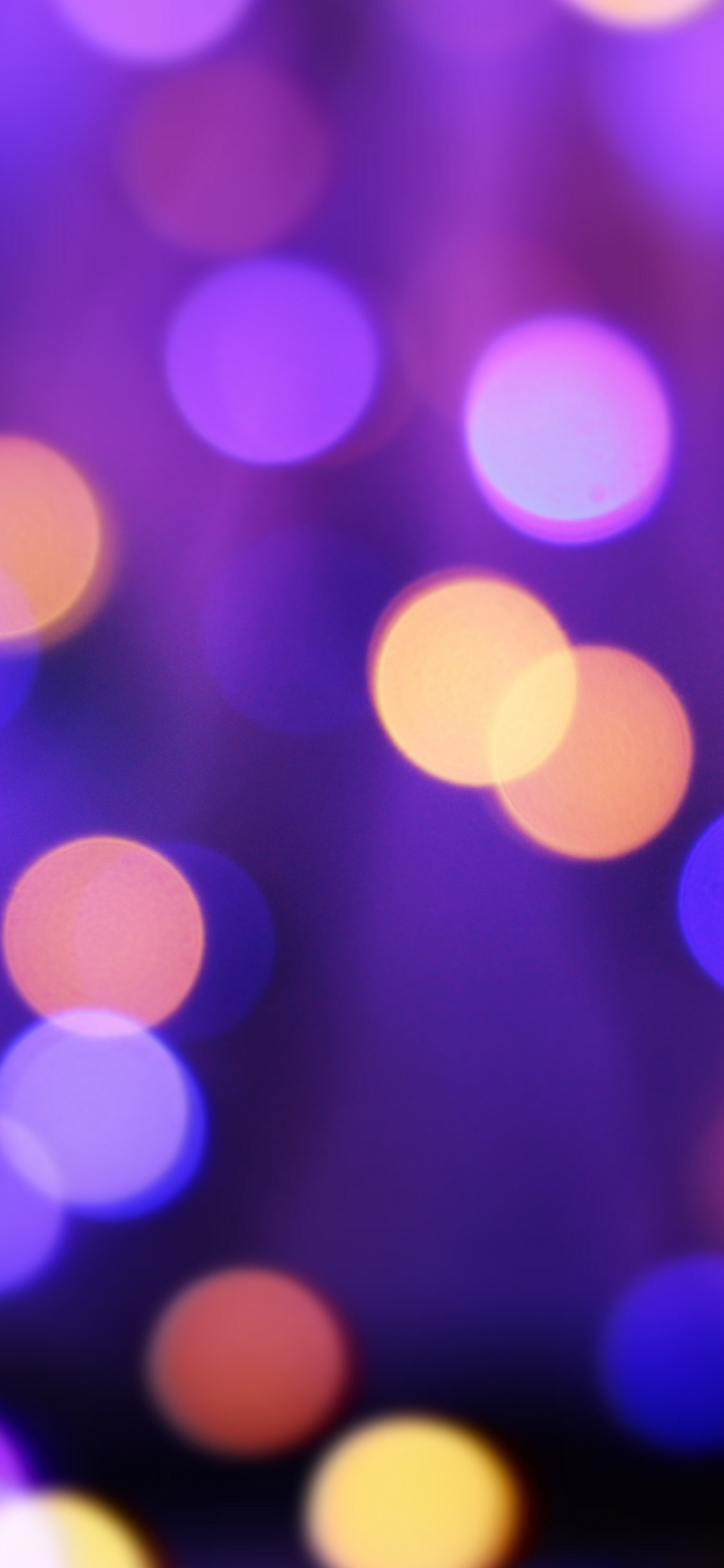 Luces Bokeh Moradas y Blancas. Wallpaper in 1125x2436 Resolution