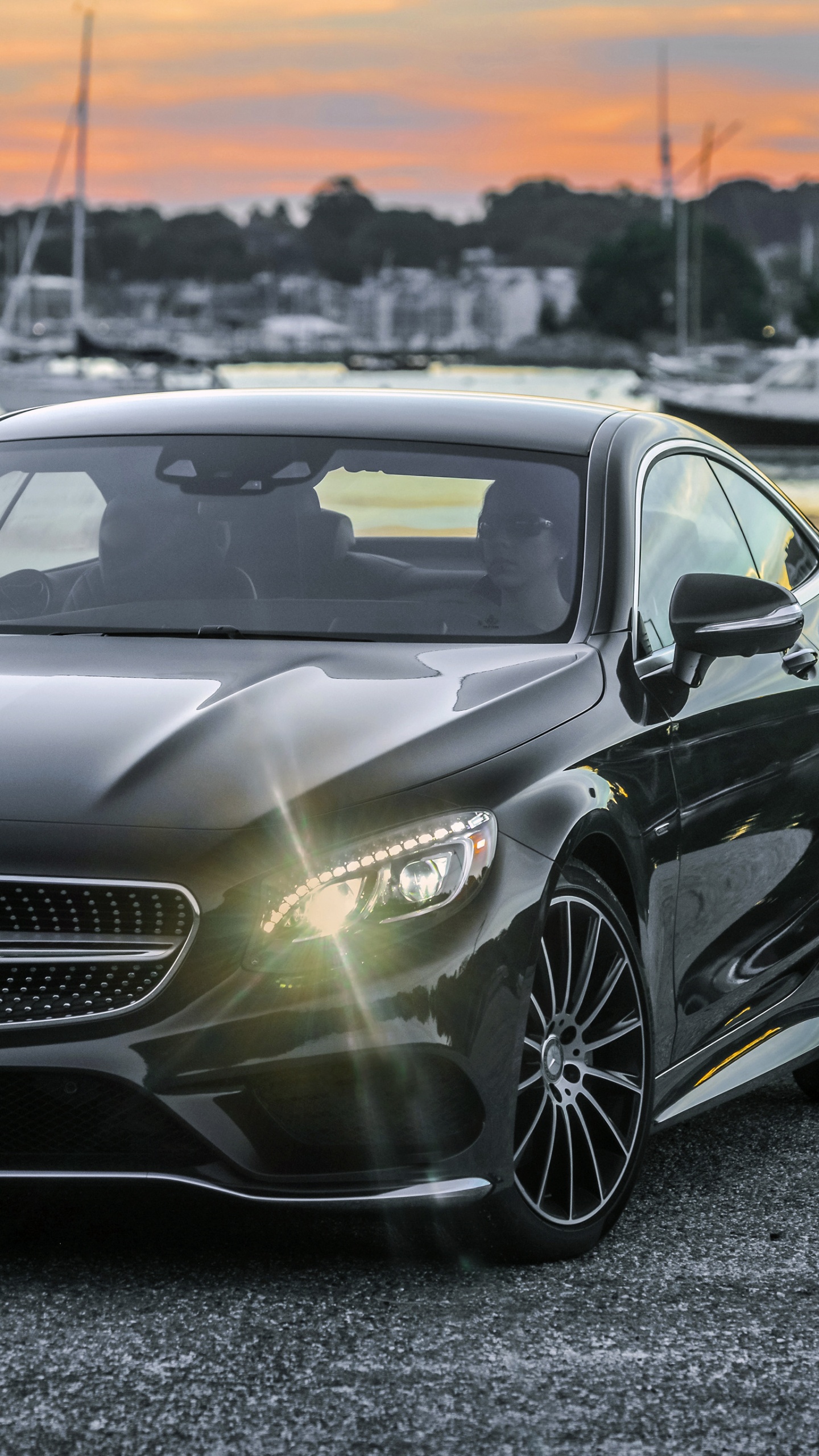 Black Mercedes Benz Coupe on Road During Daytime. Wallpaper in 1440x2560 Resolution