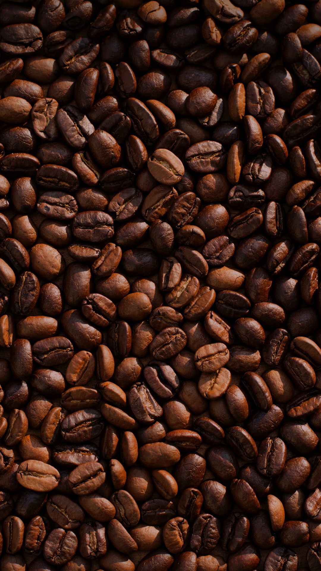 Kaffeebohnen Auf Brauner Holzoberfläche. Wallpaper in 1080x1920 Resolution