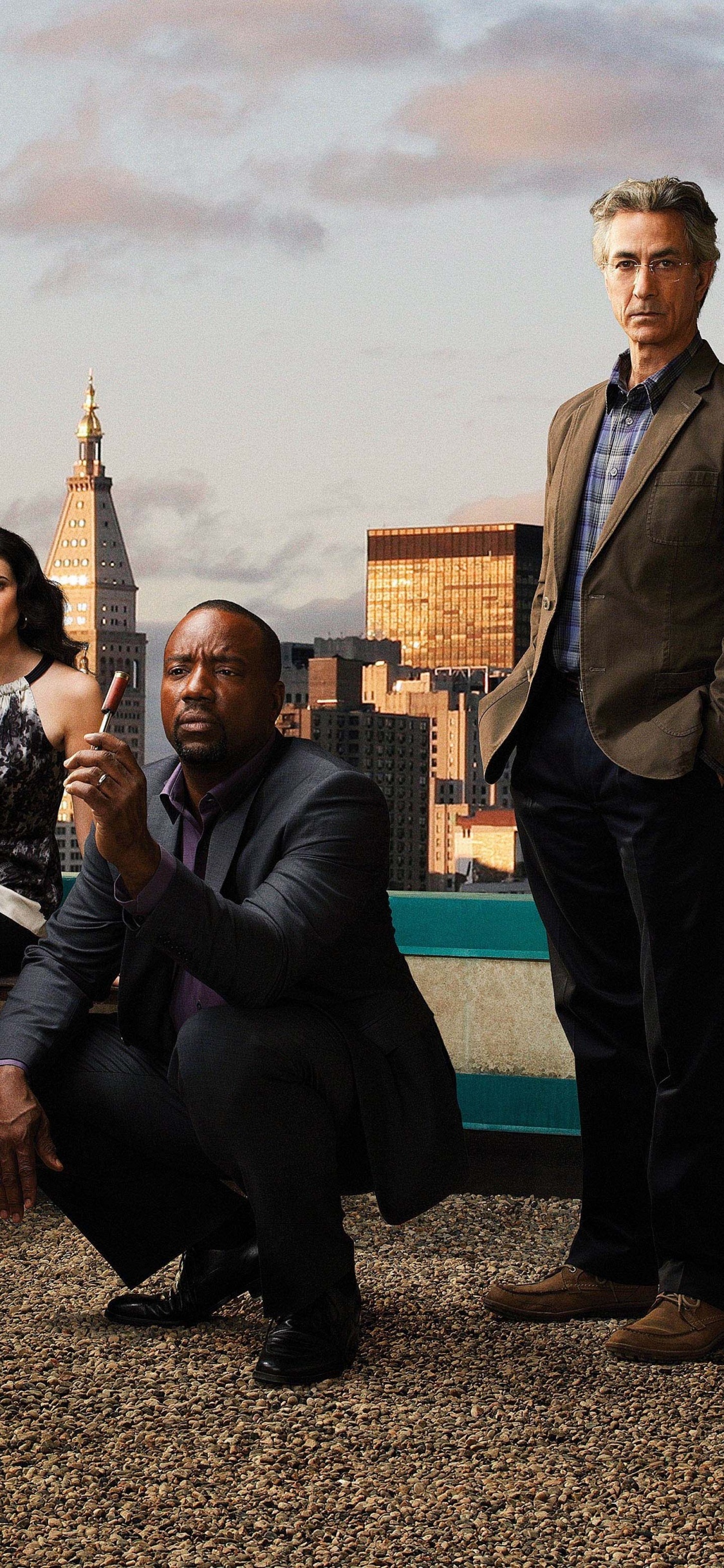 Group of People Sitting on Bench. Wallpaper in 1125x2436 Resolution