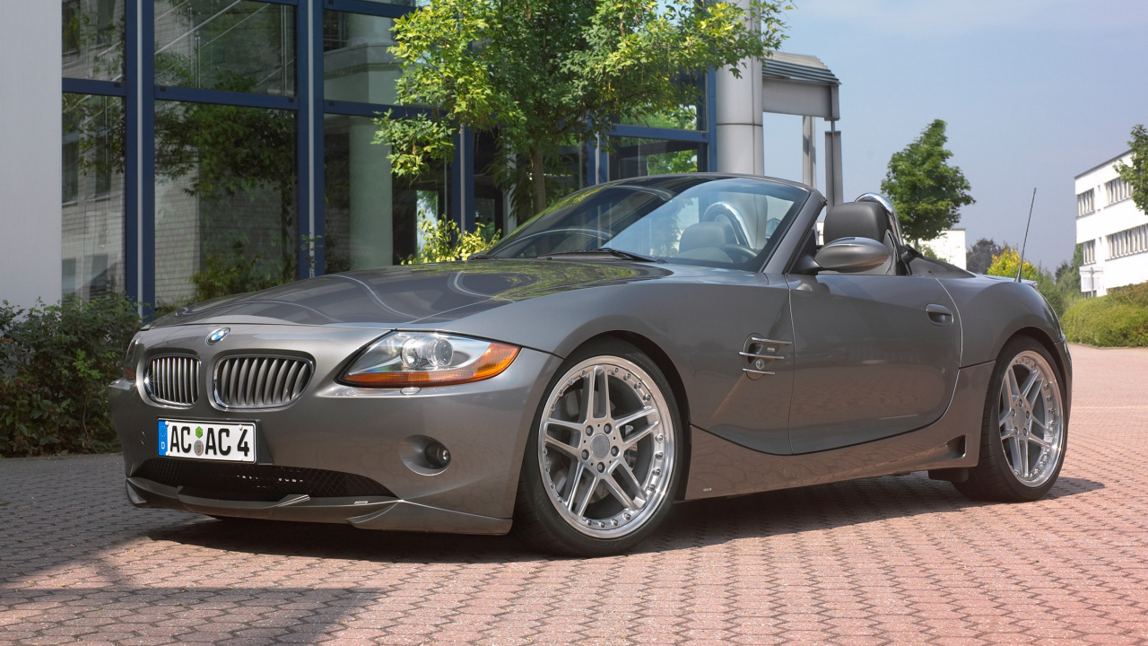 Porsche 911 Noire Garée Près de L'arbre Vert Pendant la Journée. Wallpaper in 1280x720 Resolution