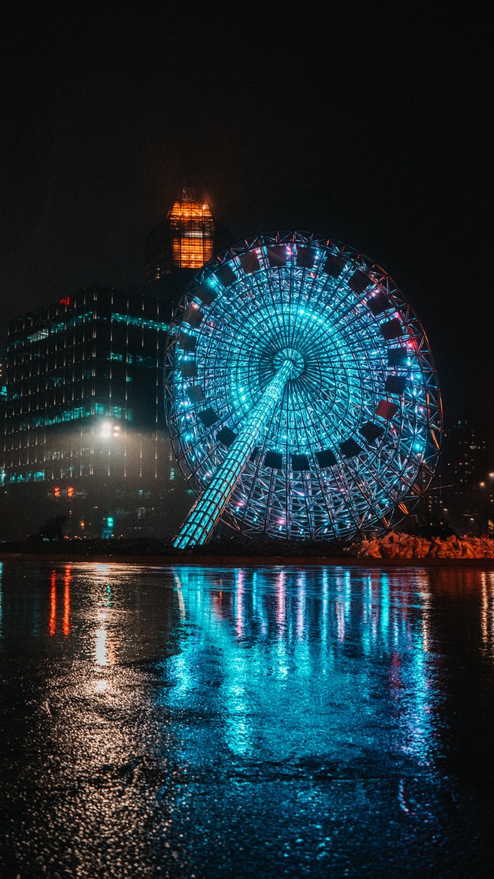 Blue and White Ferris Wheel During Night Time. Wallpaper in 720x1280 Resolution