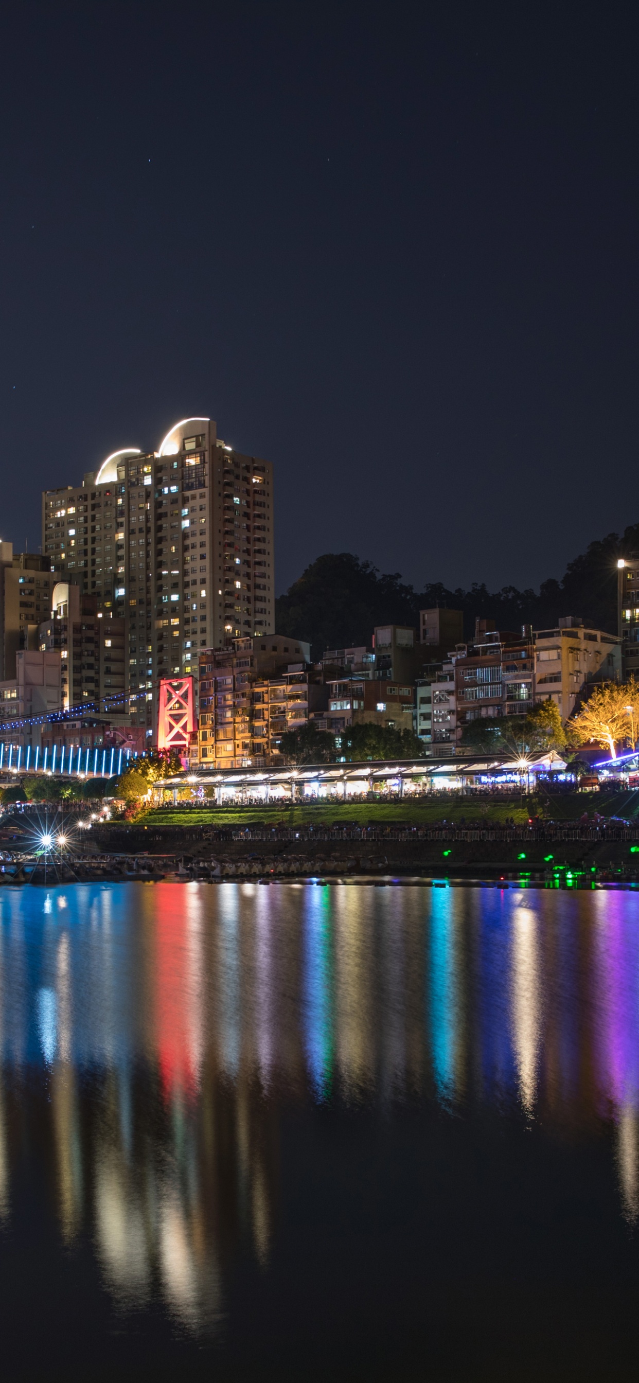 City Skyline During Night Time. Wallpaper in 1242x2688 Resolution
