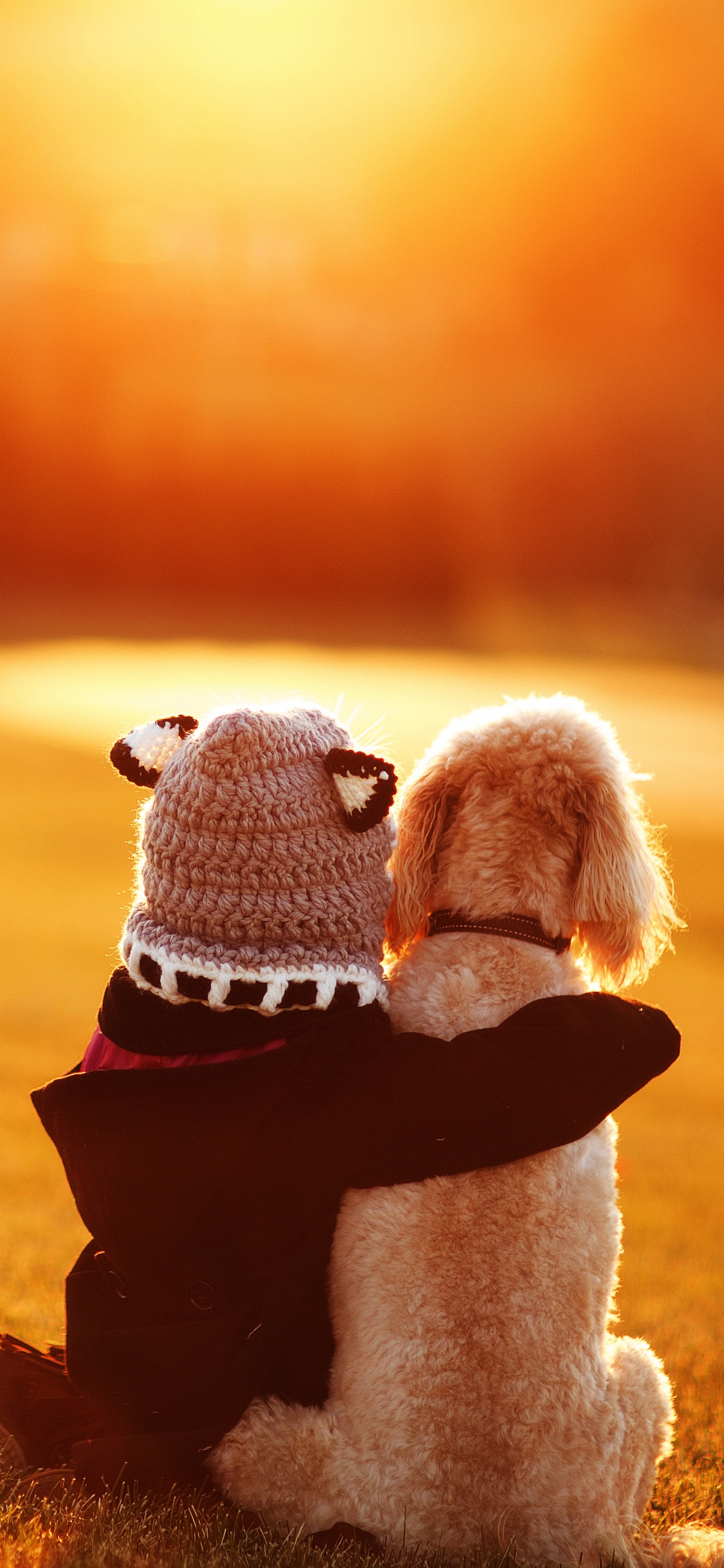 White and Red Snowman Plush Toy on Brown Field During Daytime. Wallpaper in 1125x2436 Resolution