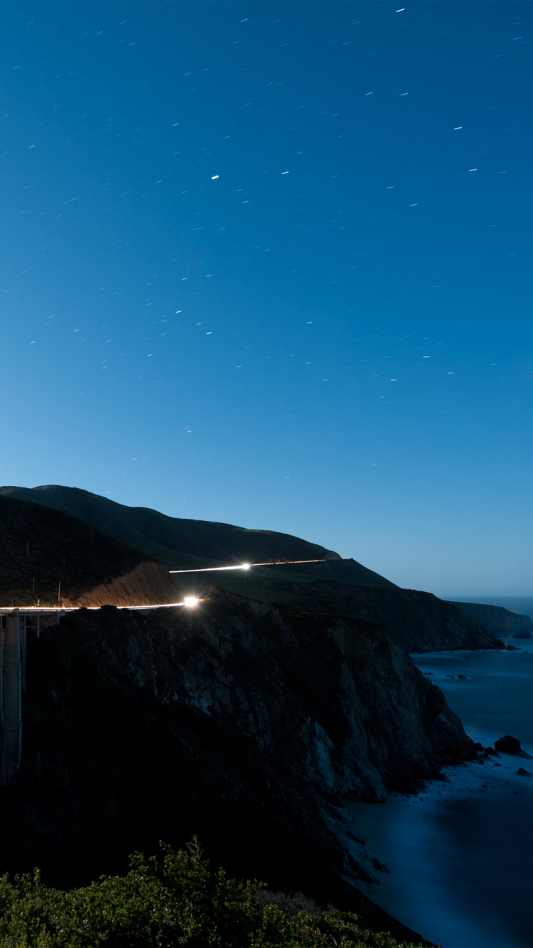 White Wooden Bridge Over Blue Sea During Daytime. Wallpaper in 750x1334 Resolution