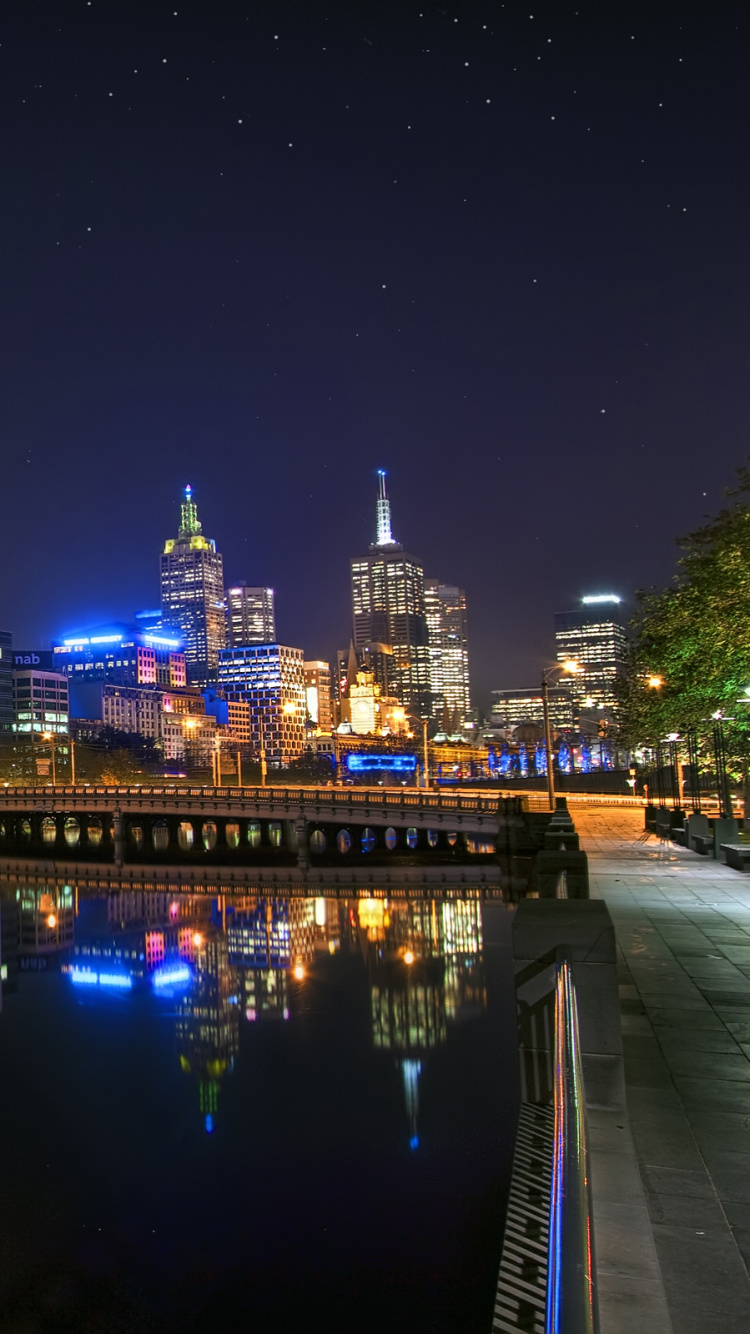 City Skyline During Night Time. Wallpaper in 750x1334 Resolution