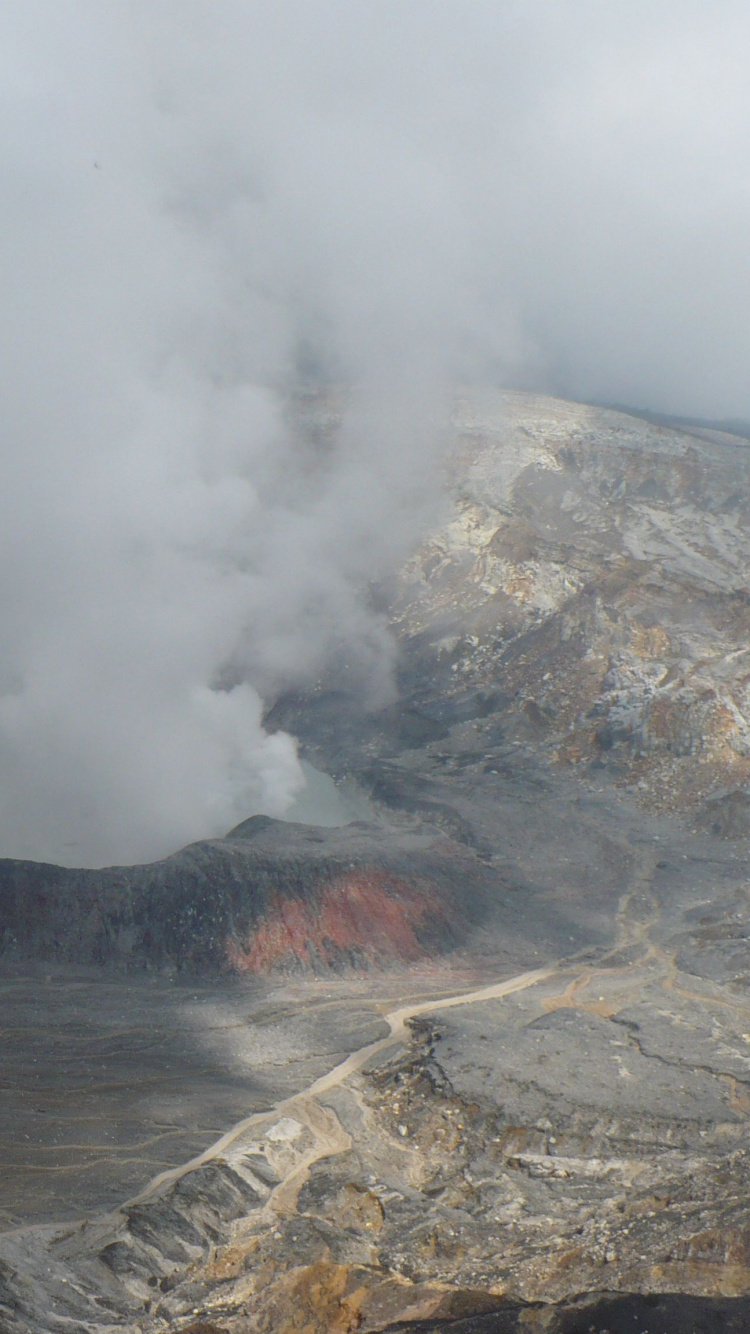 Gray and Brown Mountain With White Clouds. Wallpaper in 750x1334 Resolution