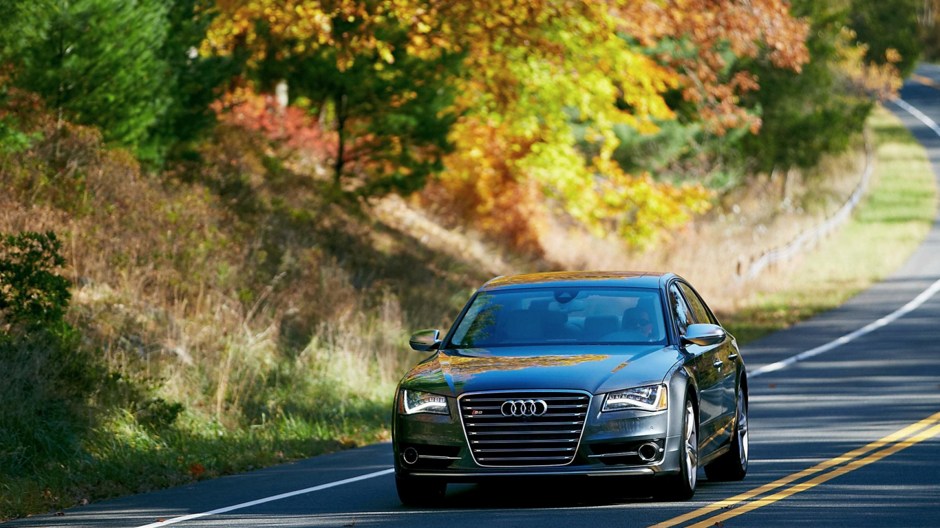 Audi Noir a 4 Sur Route Pendant la Journée. Wallpaper in 1366x768 Resolution