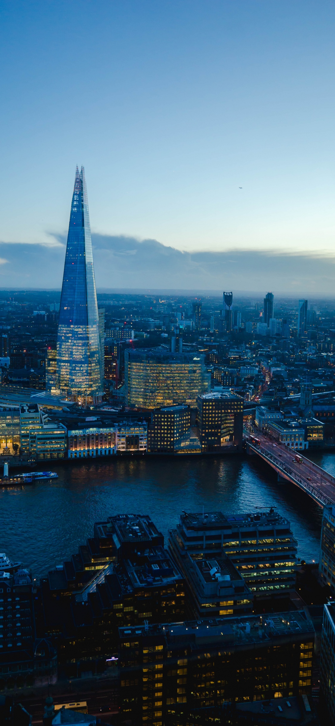 Vue Aérienne Des Bâtiments de la Ville Pendant la Journée. Wallpaper in 1125x2436 Resolution