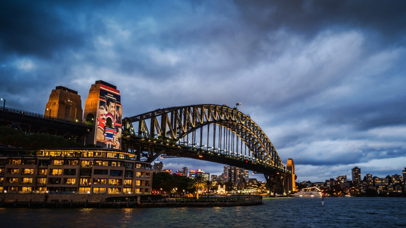 Bridge Over Body of Water During Night Time. Wallpaper in 1366x768 Resolution