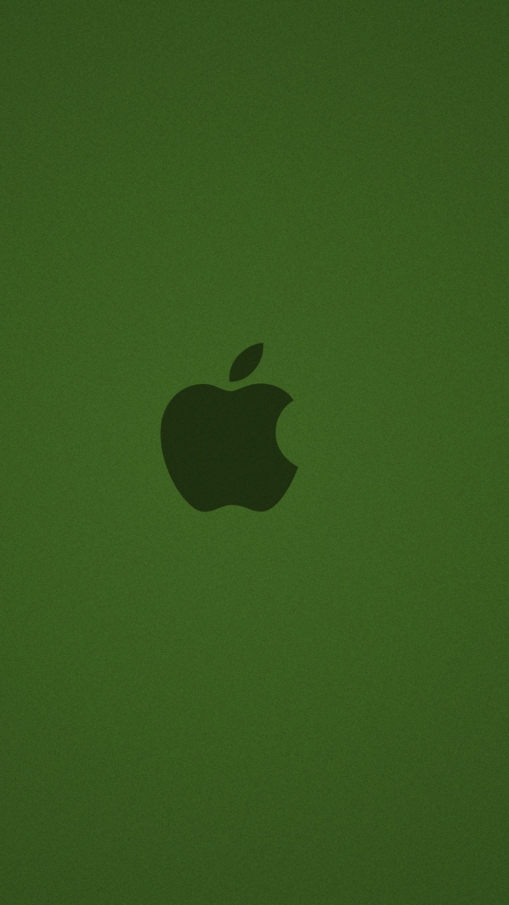 Apple Logo on Green Surface. Wallpaper in 720x1280 Resolution