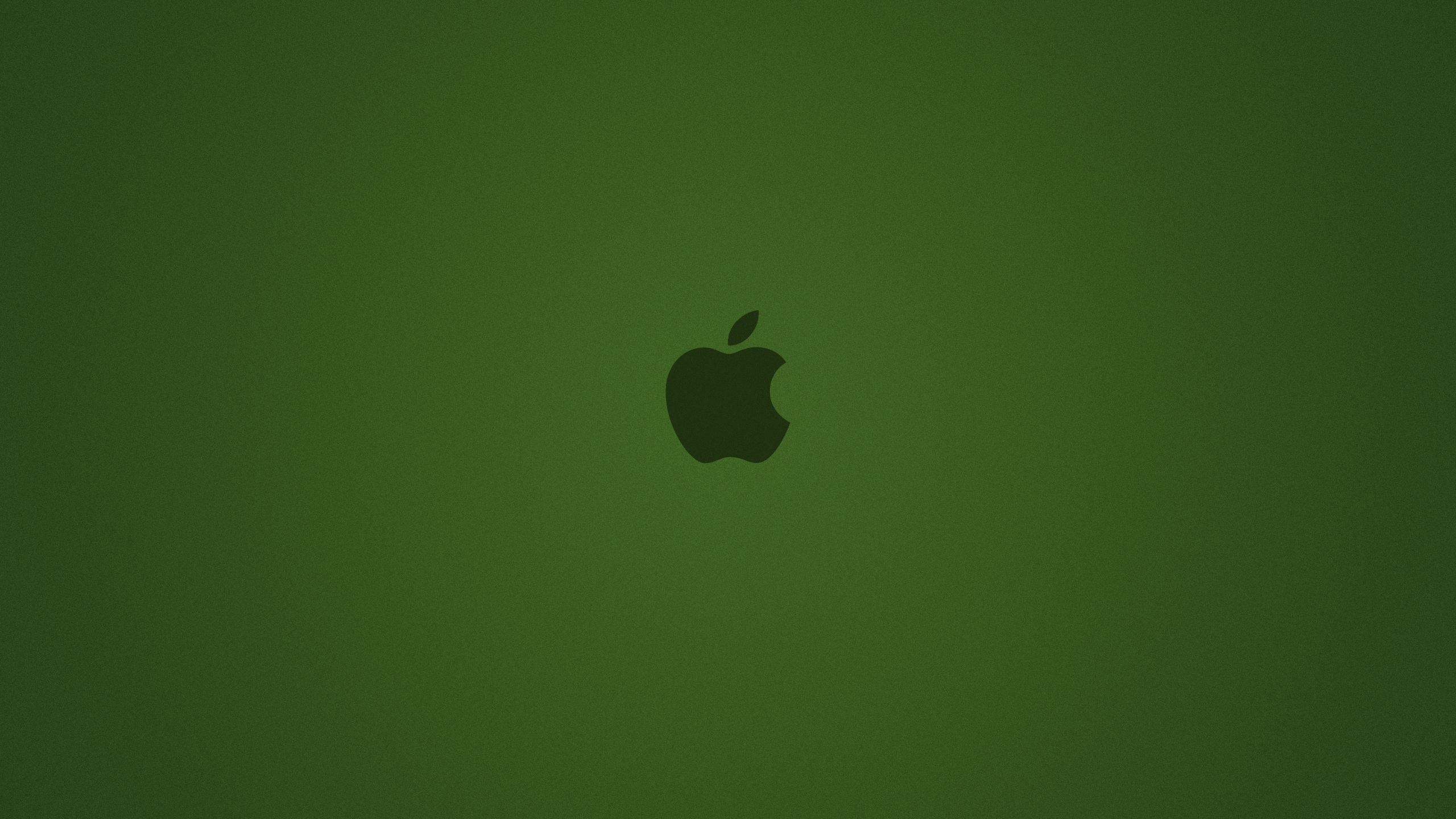 Logo Pomme Sur Surface Verte. Wallpaper in 2560x1440 Resolution