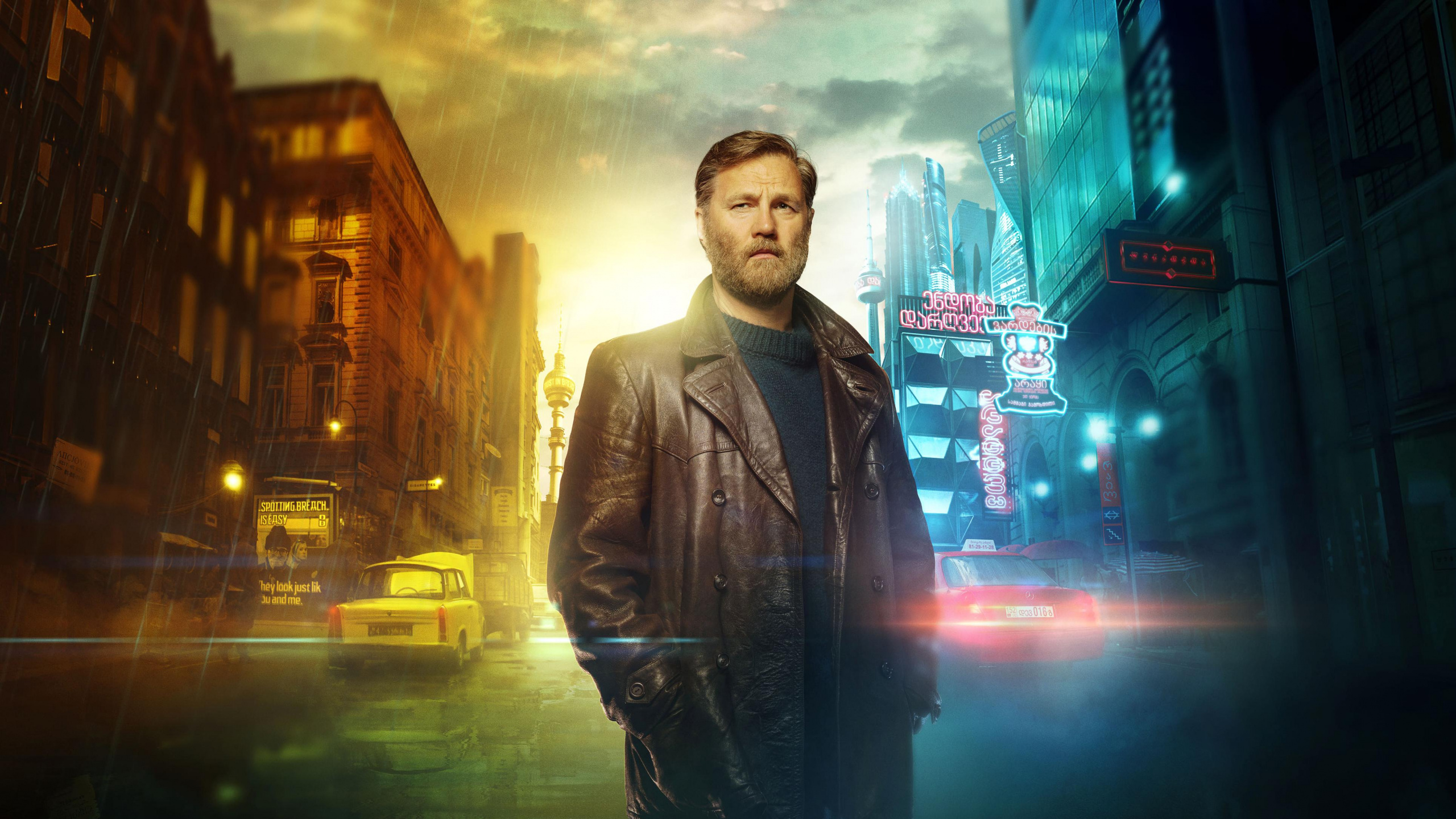 L'homme en Blouson de Cuir Noir Debout Sur le Trottoir Pendant la Nuit. Wallpaper in 2560x1440 Resolution