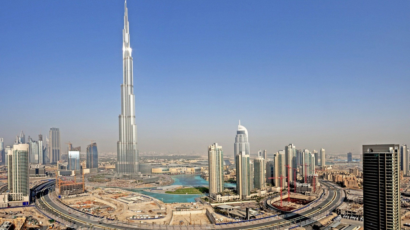 City Skyline Under Blue Sky During Daytime. Wallpaper in 1366x768 Resolution