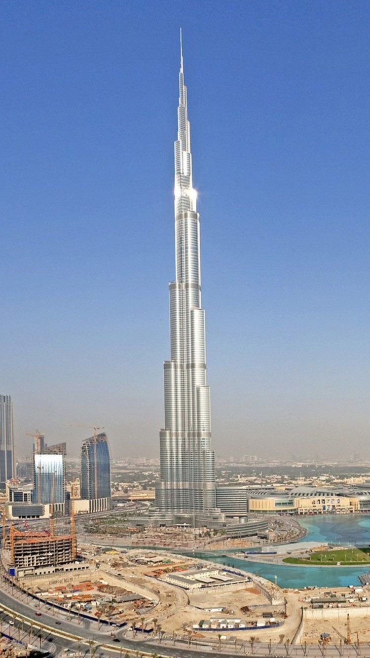 City Skyline Under Blue Sky During Daytime. Wallpaper in 750x1334 Resolution