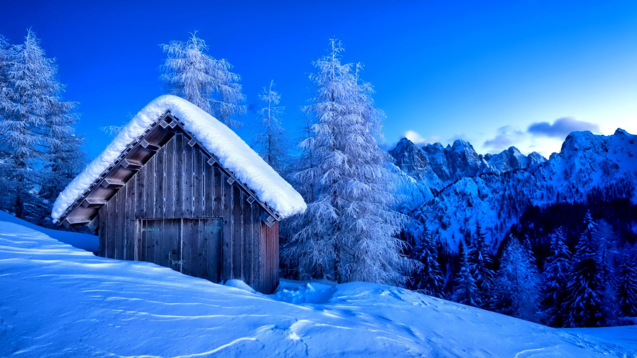 Brown Wooden House Near Green Trees and Snow Covered Mountain During Daytime. Wallpaper in 1280x720 Resolution