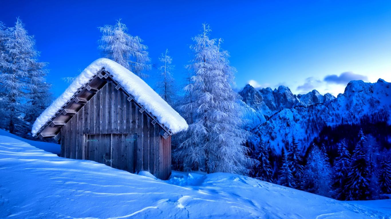 Brown Wooden House Near Green Trees and Snow Covered Mountain During Daytime. Wallpaper in 1366x768 Resolution