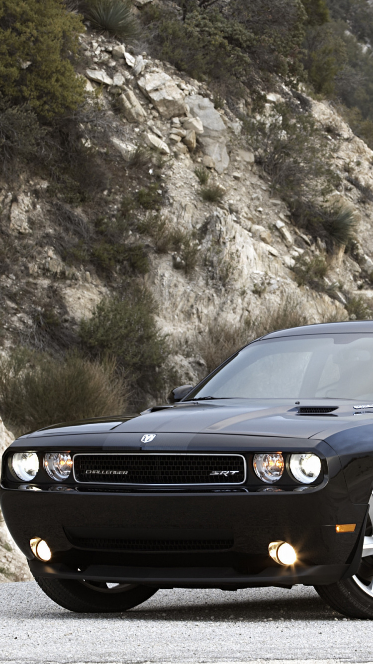 Black Bmw m 3 Coupe on Gray Rock Mountain During Daytime. Wallpaper in 750x1334 Resolution