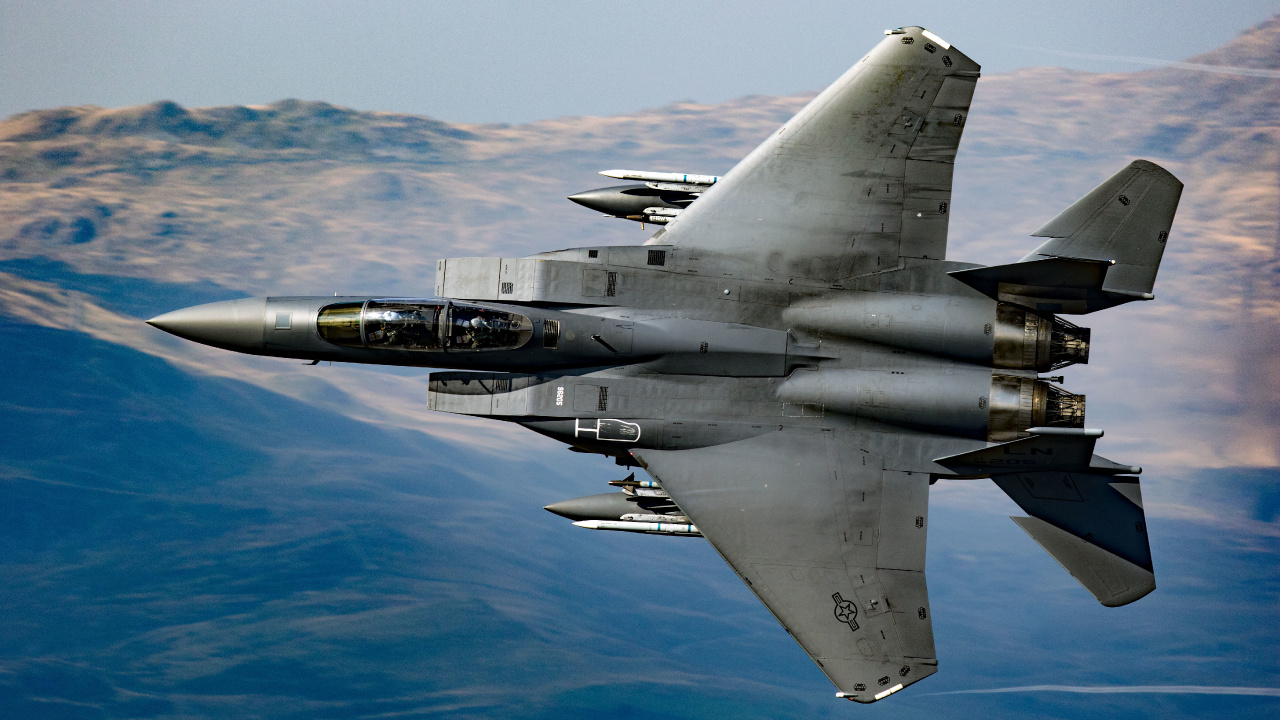 Gray Fighter Jet Flying Over Blue Sky During Daytime. Wallpaper in 1280x720 Resolution