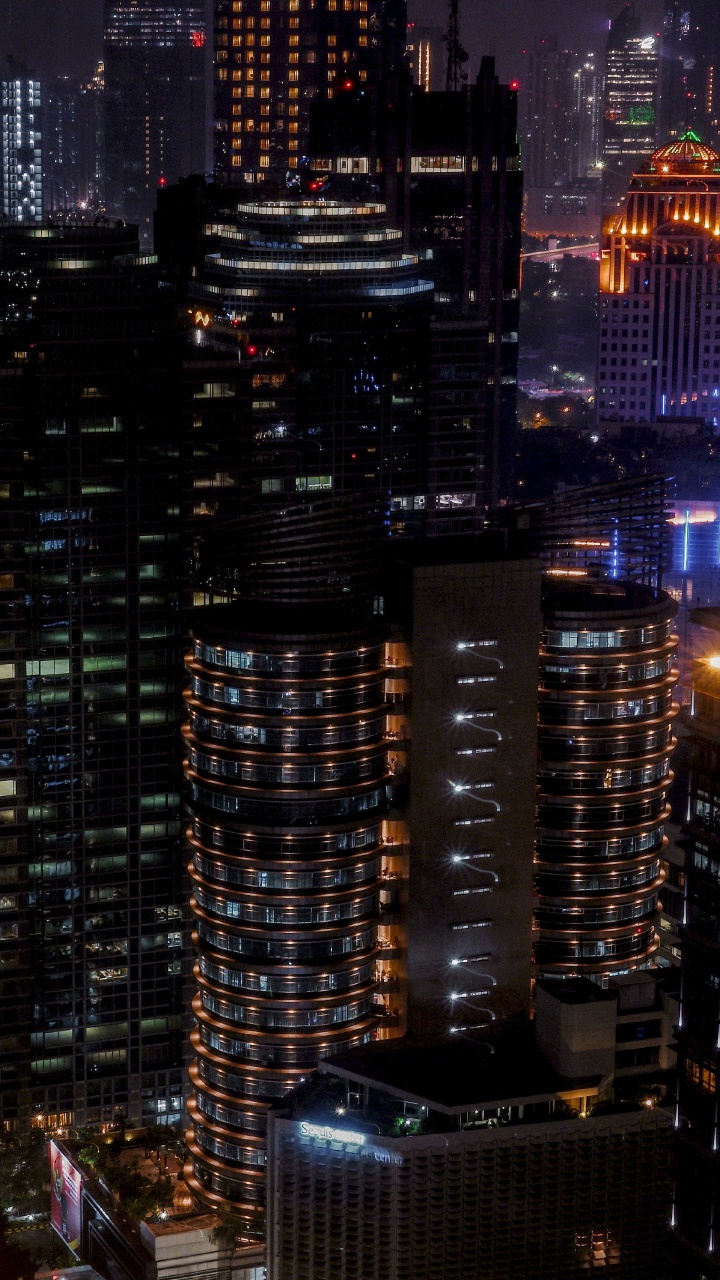 High Rise Buildings During Night Time. Wallpaper in 720x1280 Resolution