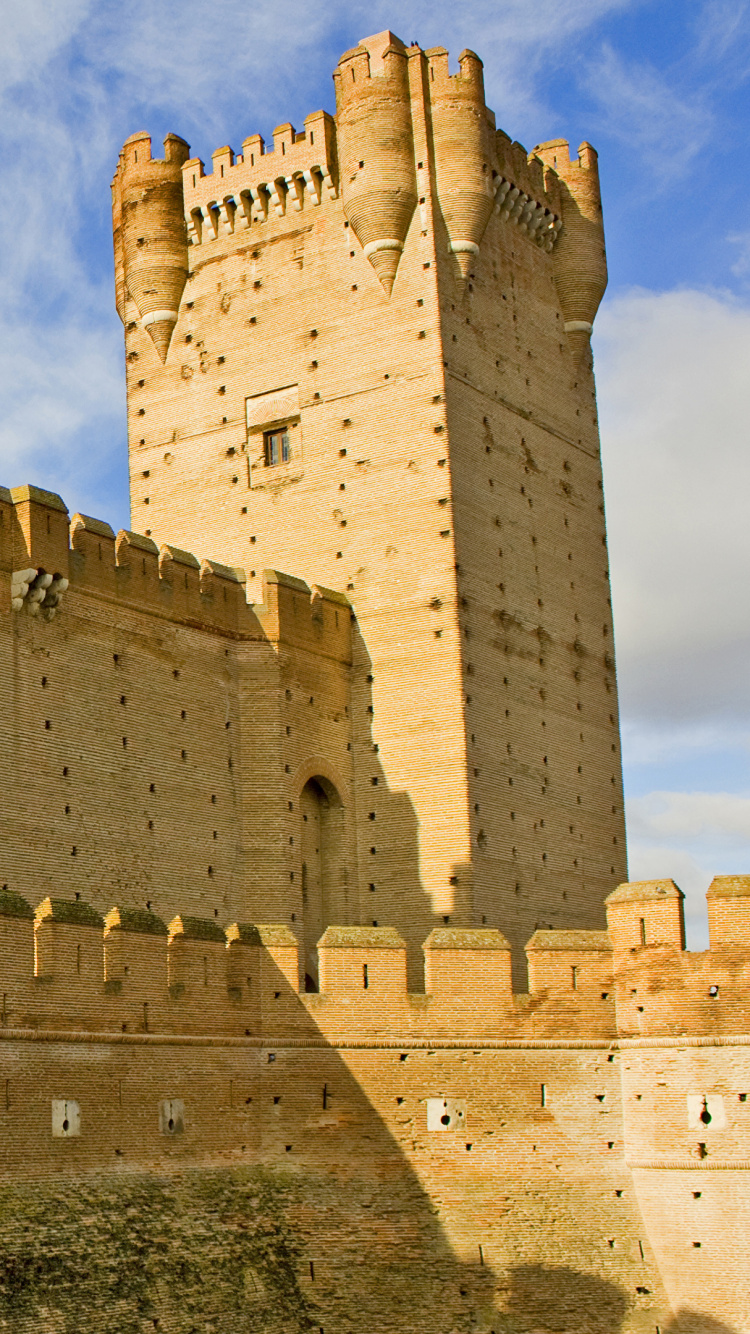 Brown Concrete Castle Under Cloudy Sky During Daytime. Wallpaper in 750x1334 Resolution