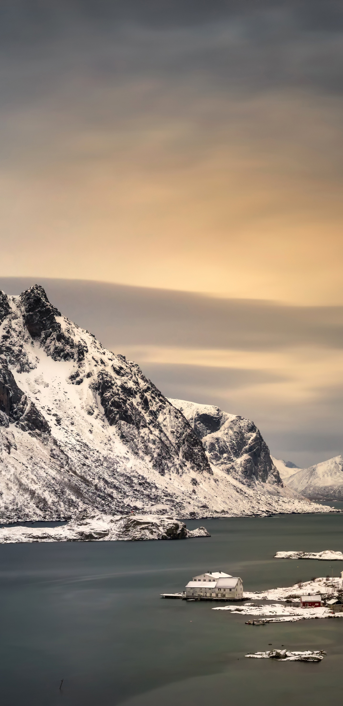 Snow Covered Mountain Near Body of Water During Daytime. Wallpaper in 1440x2960 Resolution