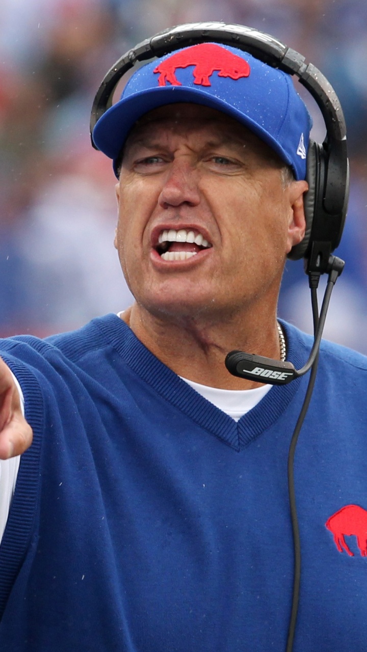 Man in Blue Nike Crew Neck Long Sleeve Shirt Wearing Black Headphones. Wallpaper in 720x1280 Resolution