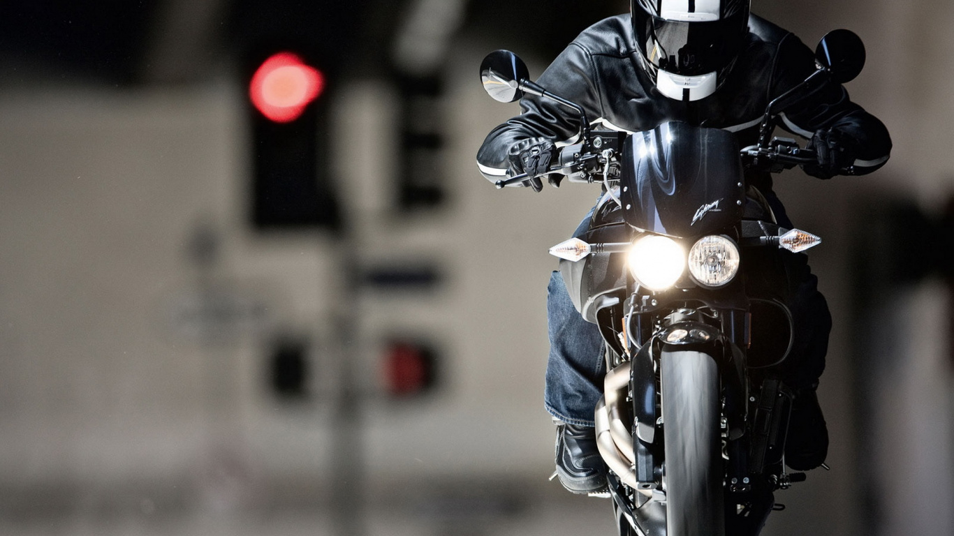 Man in Blue and Black Motorcycle Helmet Riding Motorcycle. Wallpaper in 1366x768 Resolution