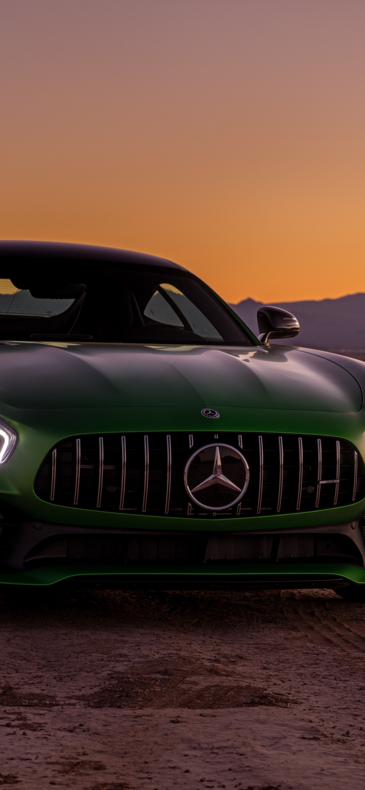 Green Bmw m 3 Coupe on Beach Shore During Sunset. Wallpaper in 1242x2688 Resolution