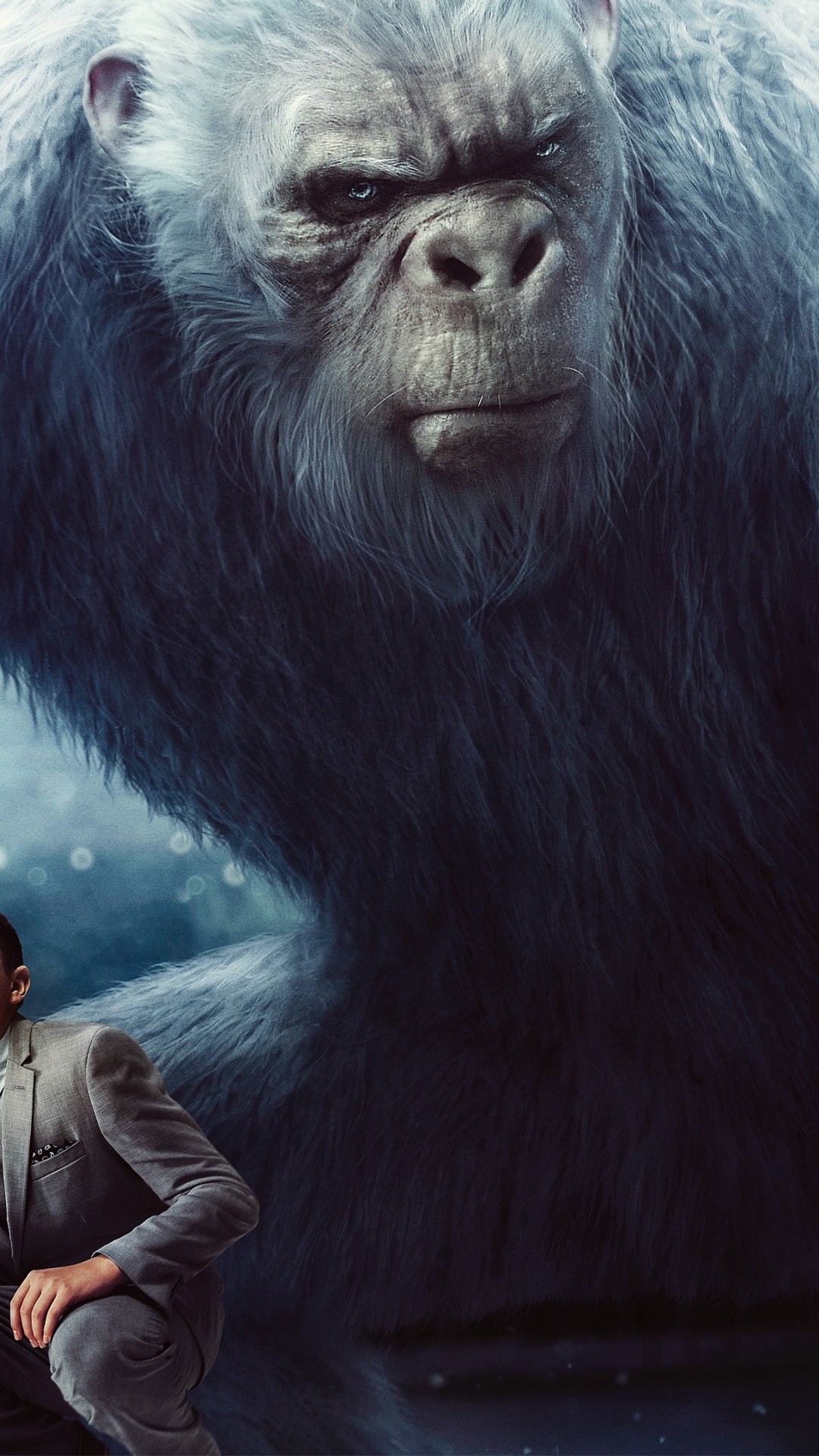 Man in Black Jacket and Black Cap Sitting on Gray Rock. Wallpaper in 1080x1920 Resolution