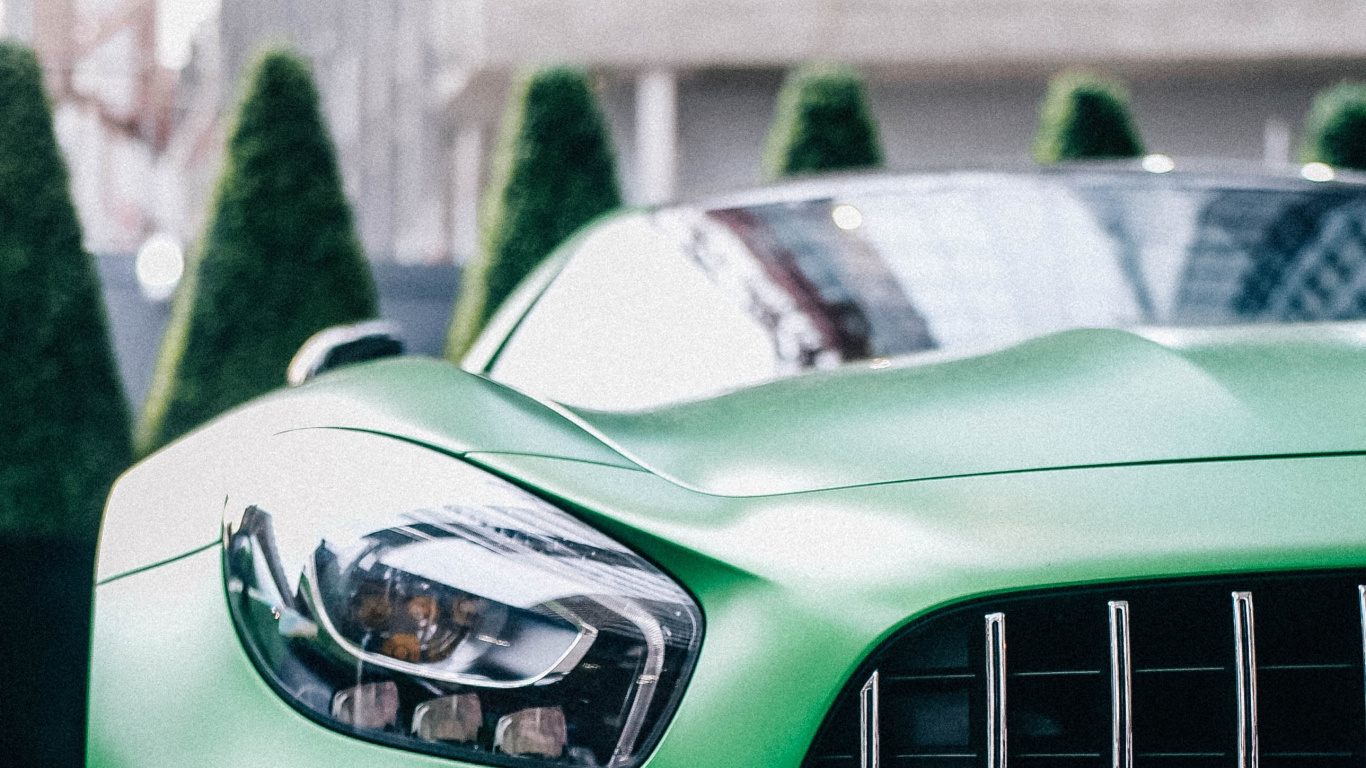 Green Car With White and Black Car on The Side. Wallpaper in 1366x768 Resolution