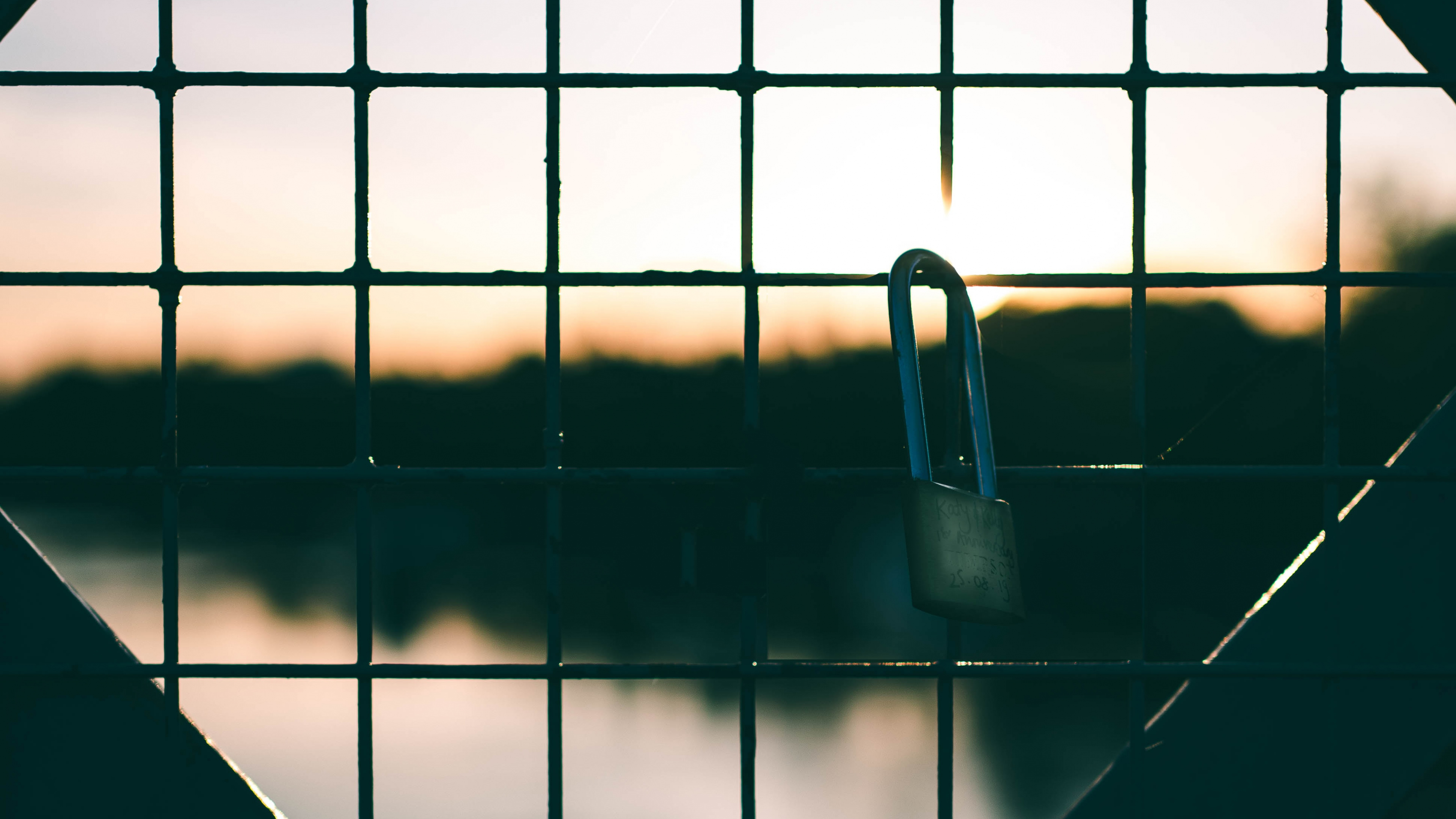 Black Metal Fence With Padlock. Wallpaper in 3840x2160 Resolution