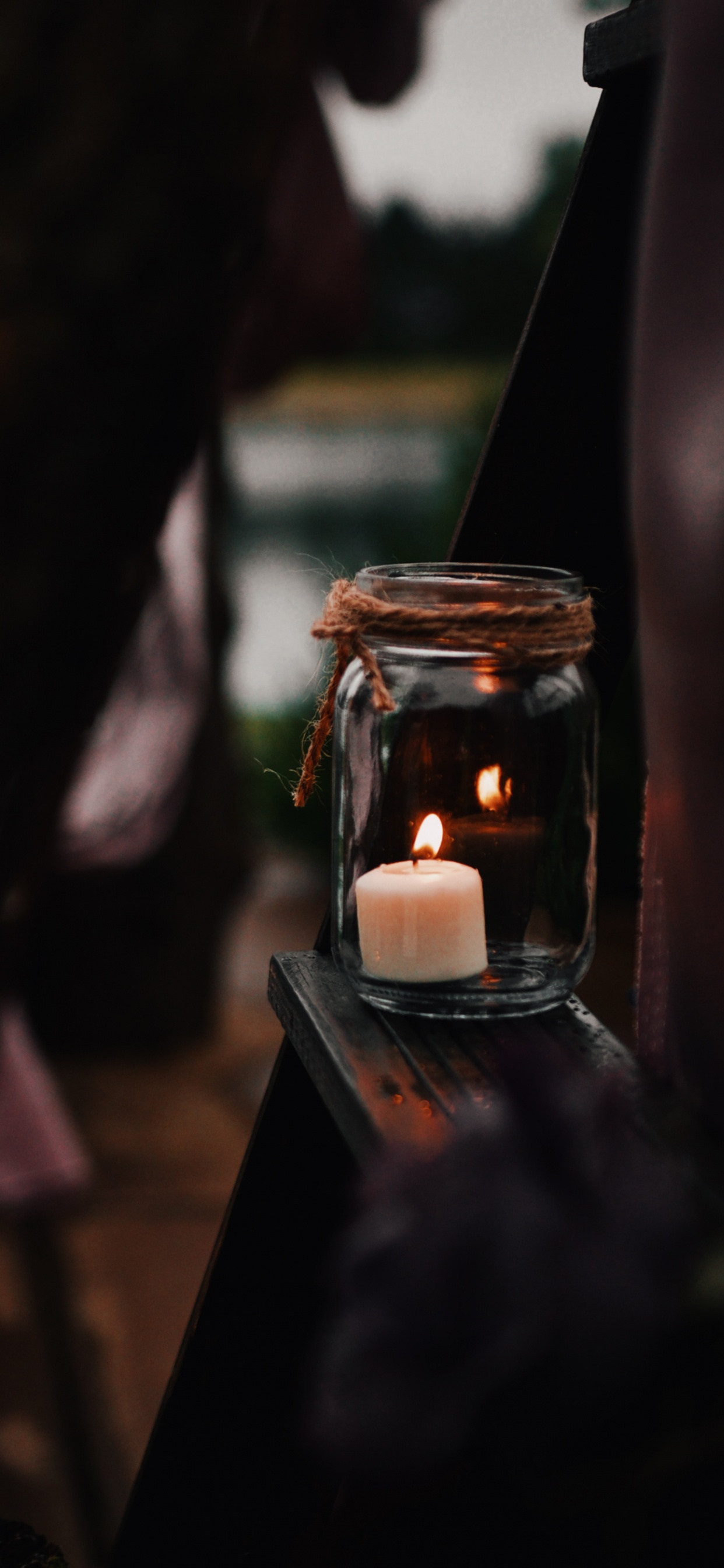 Lighted Candle in Clear Glass Jar. Wallpaper in 1242x2688 Resolution