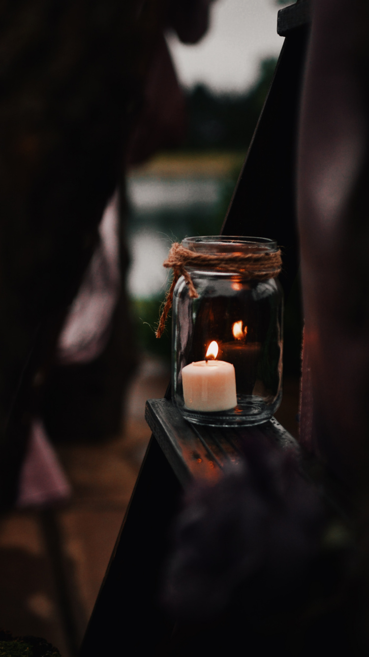 Lighted Candle in Clear Glass Jar. Wallpaper in 750x1334 Resolution