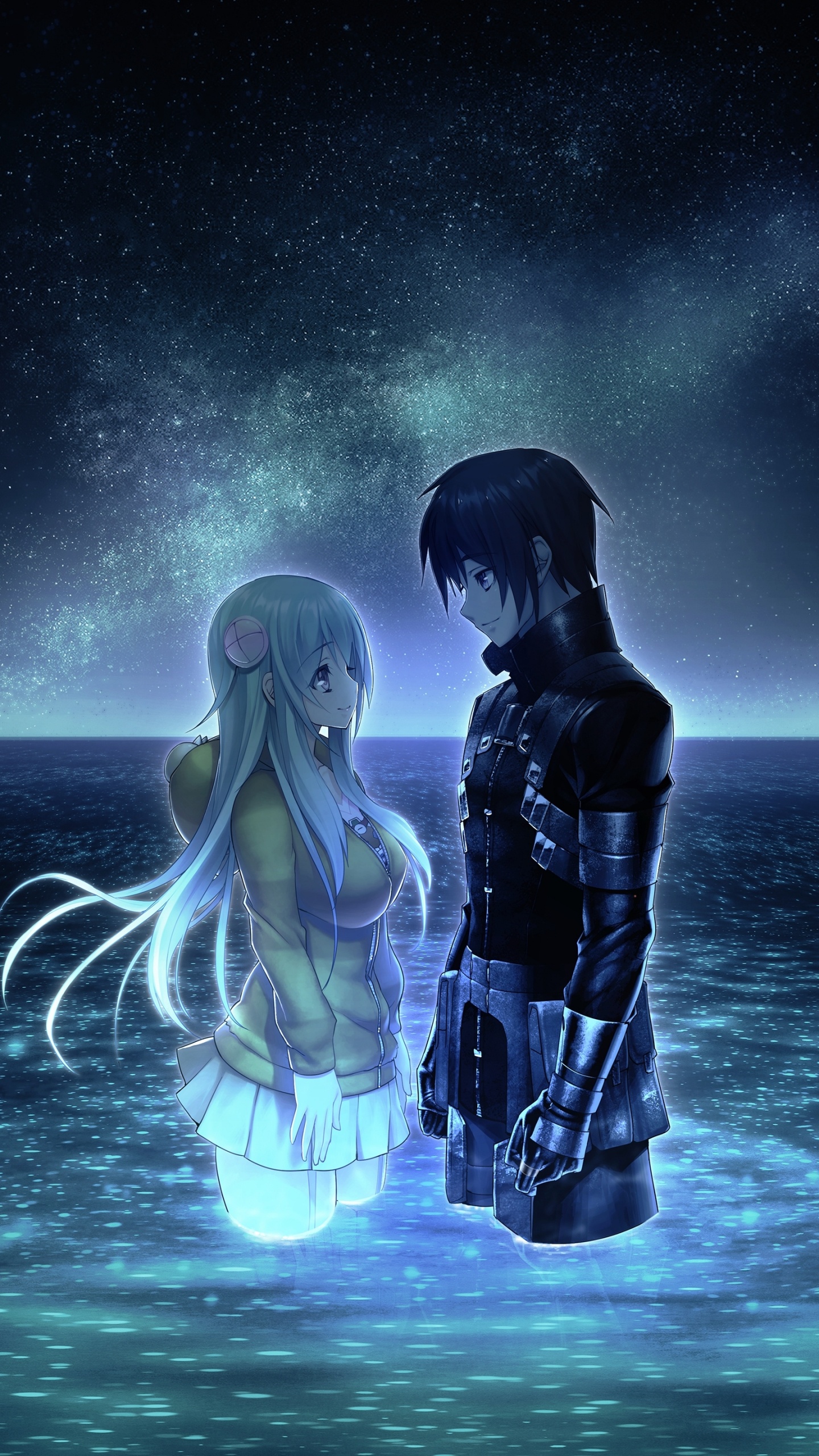 2 Angel Figurines on Beach Shore. Wallpaper in 1440x2560 Resolution