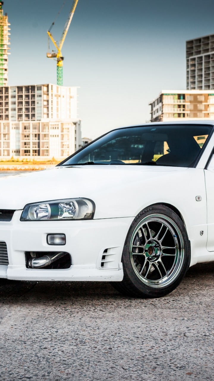 Mercedes Benz Coupe Blanco en la Carretera Durante el Día. Wallpaper in 720x1280 Resolution