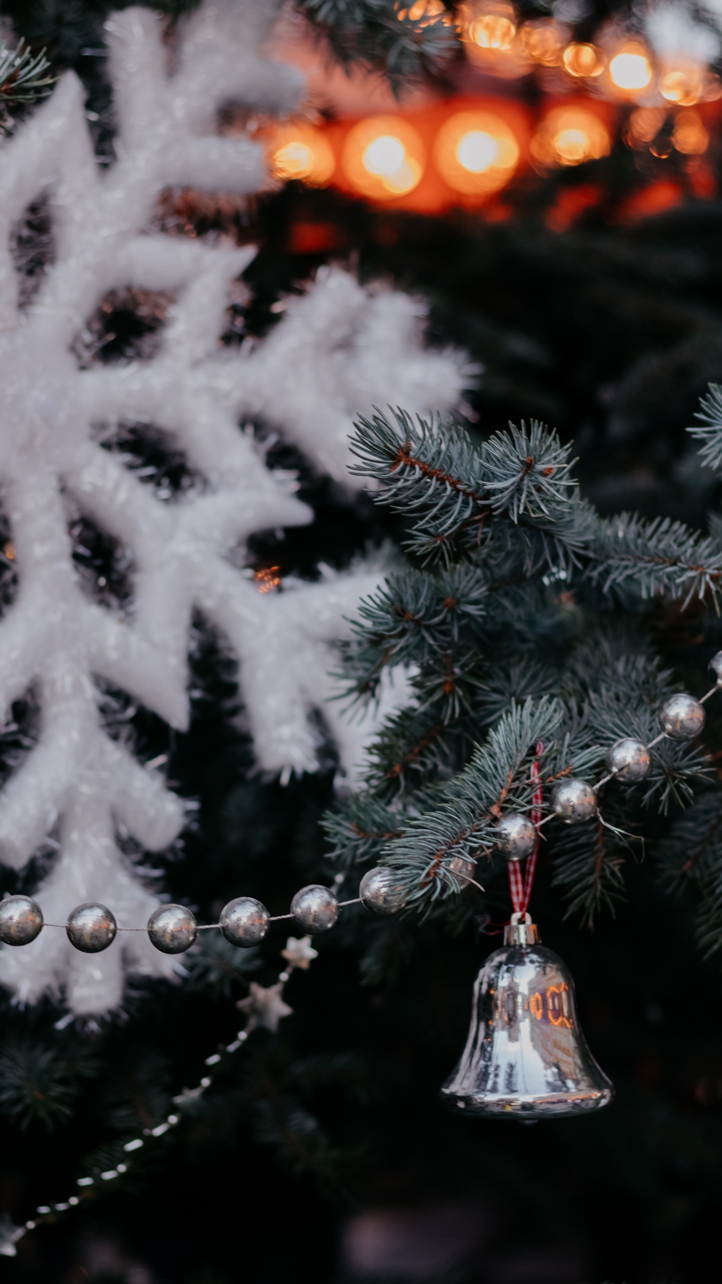White Snow Flakes on Green Pine Tree. Wallpaper in 1440x2560 Resolution