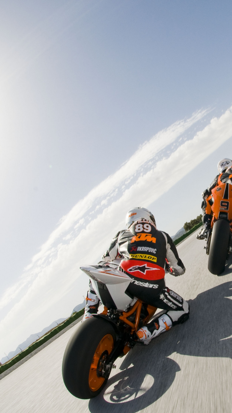 2 Men Riding Motorcycle on Road During Daytime. Wallpaper in 750x1334 Resolution